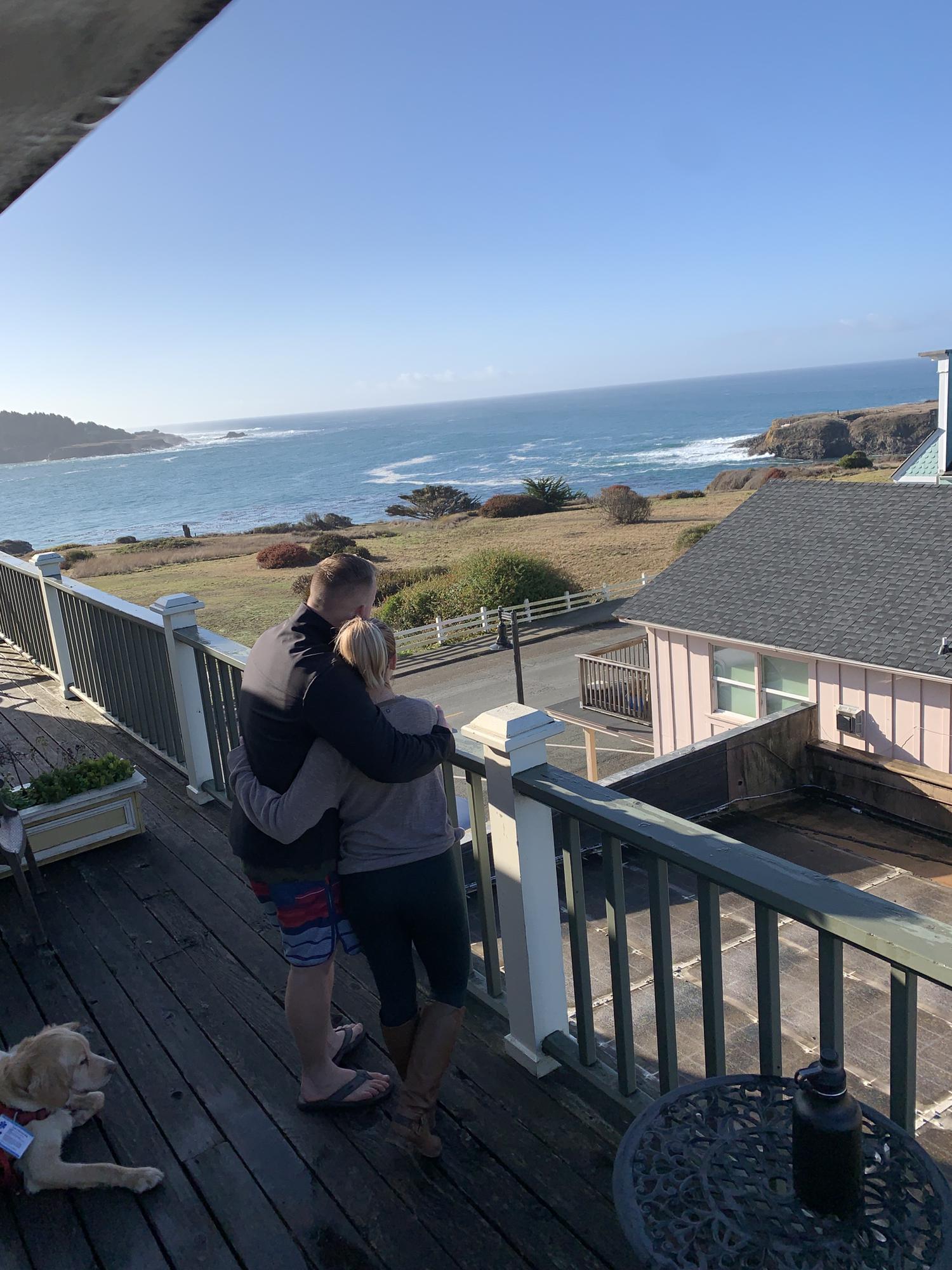 Sharing an embrace before we left for home from the Mendocino Hotel...look at that view!