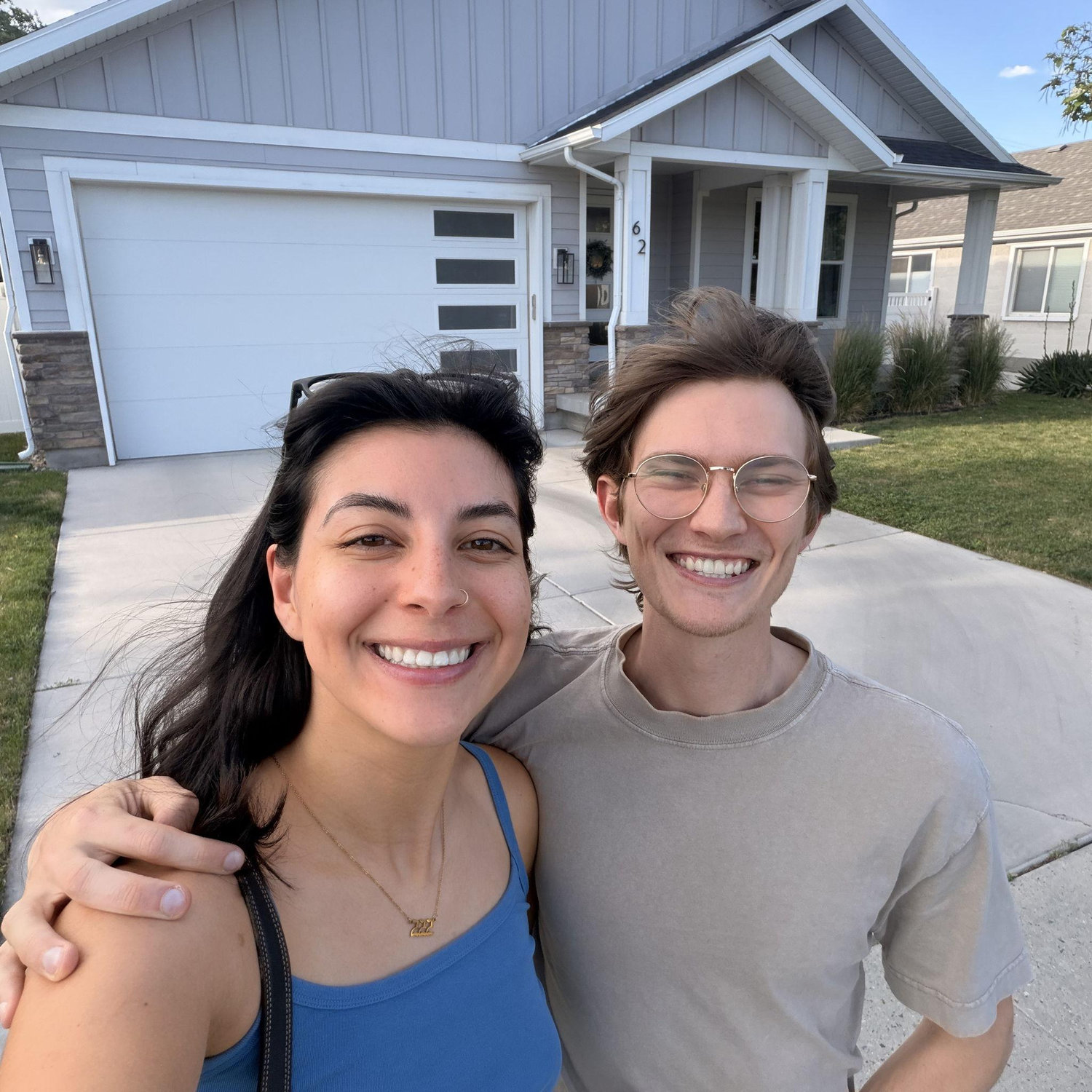 Standing in front of our new house!!! May 2026