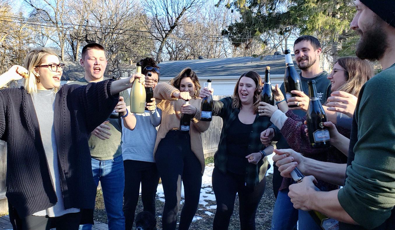 Bottle popping party after winning the Midwest Wedding Giveaway!