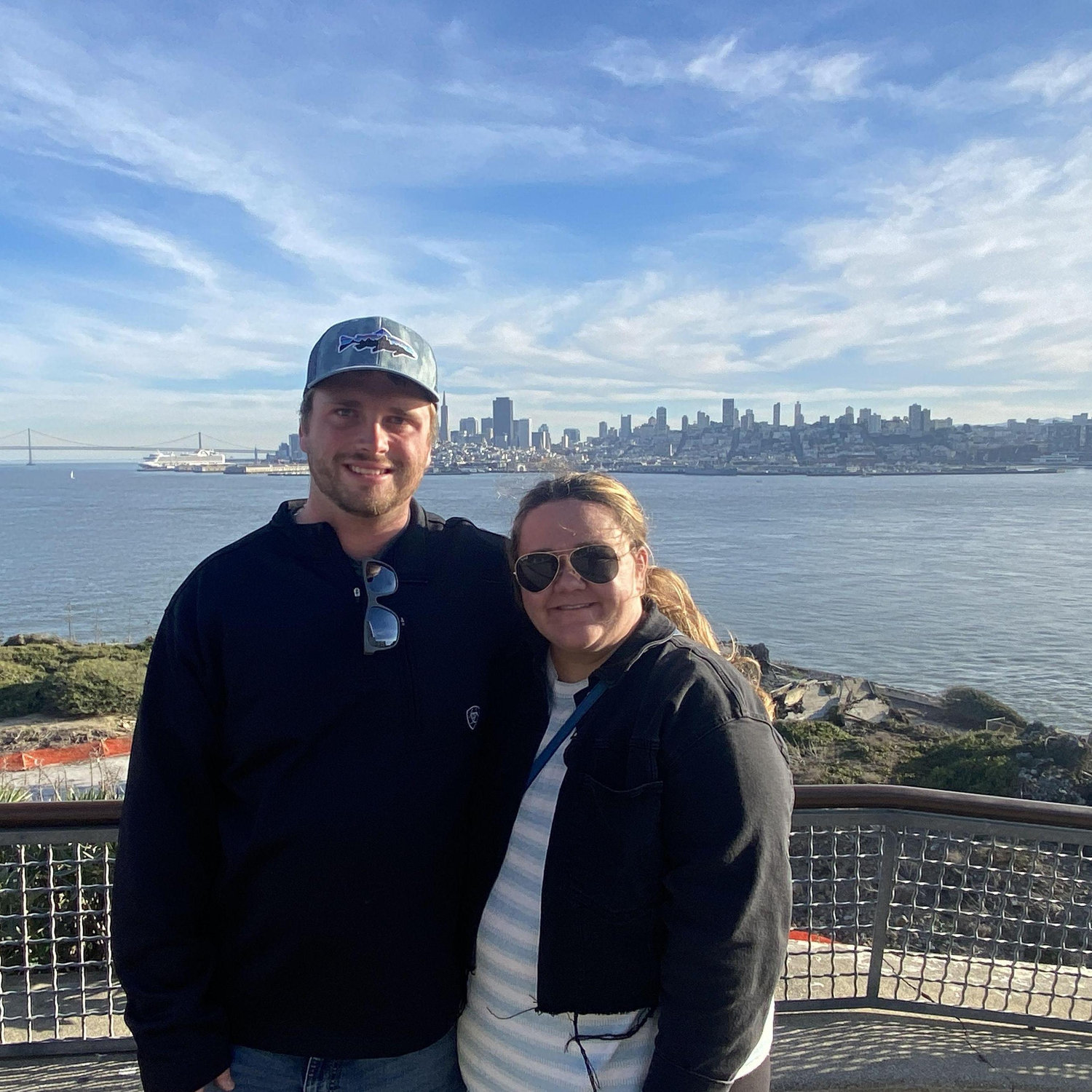 Jacob and Allison on Alcatraz with San Francisco behind.