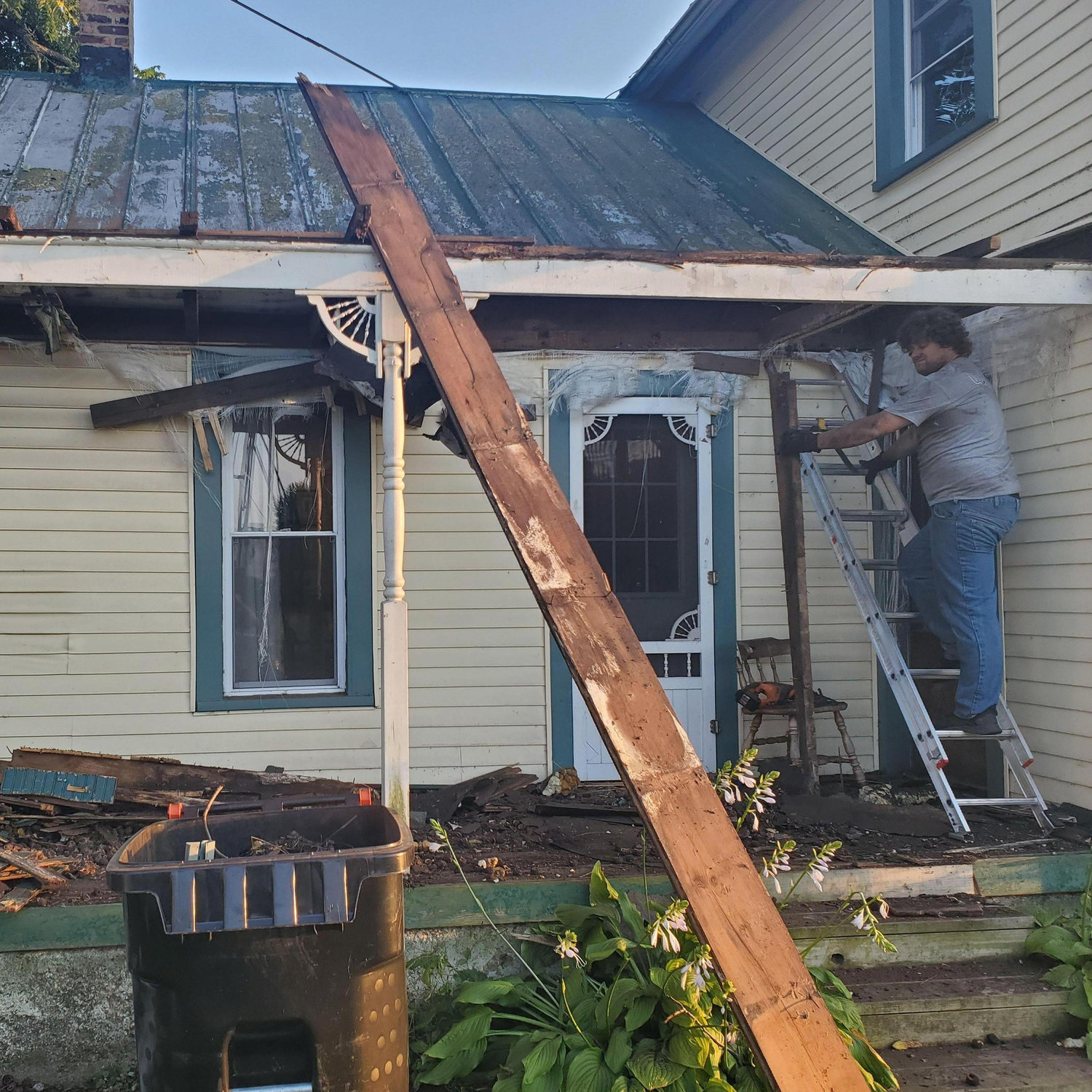 Tyler demolished the "Front" porch and completely rebuilt it. He did a beautiful job!