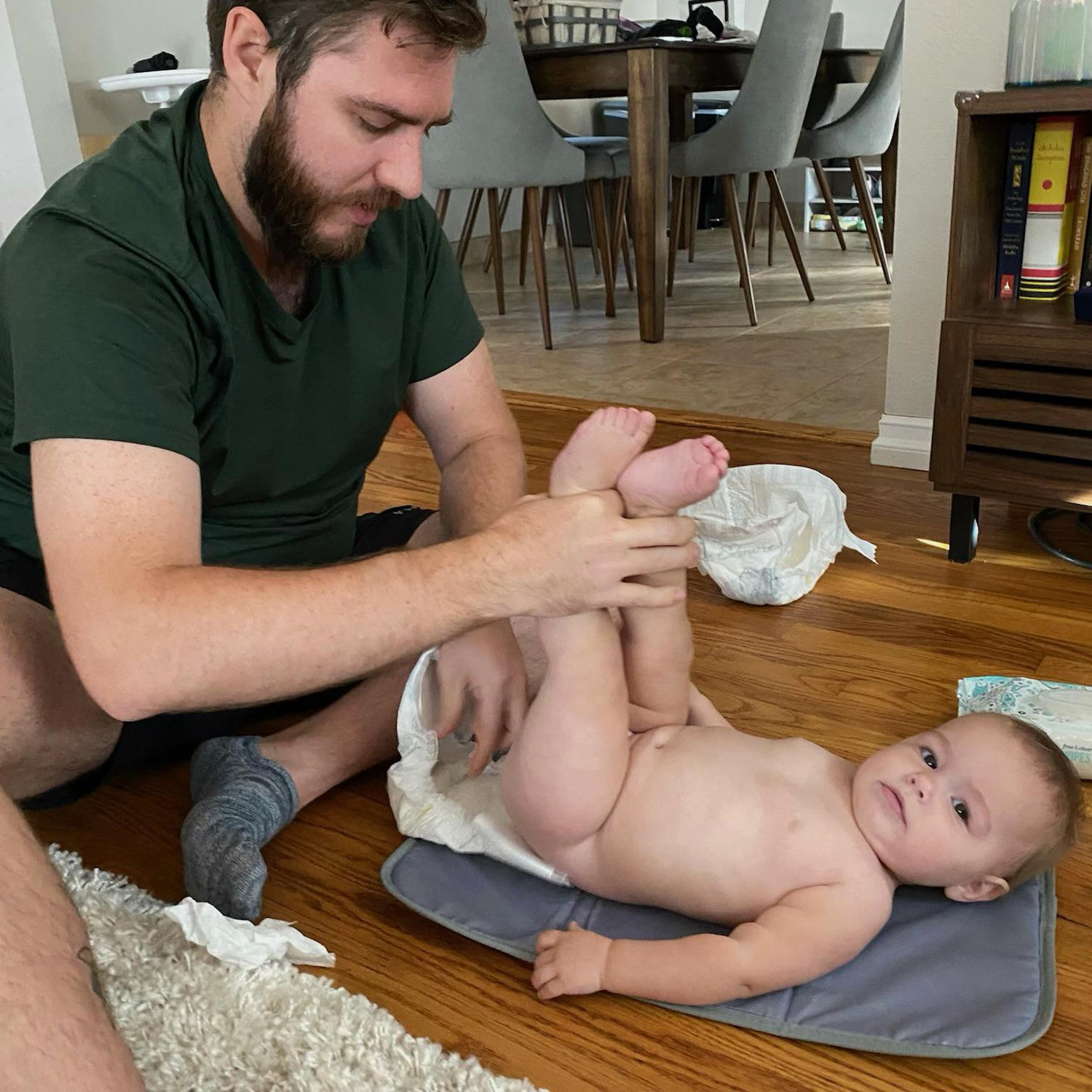 Uncle Patrick's first diaper change! Avery was a patient participant.