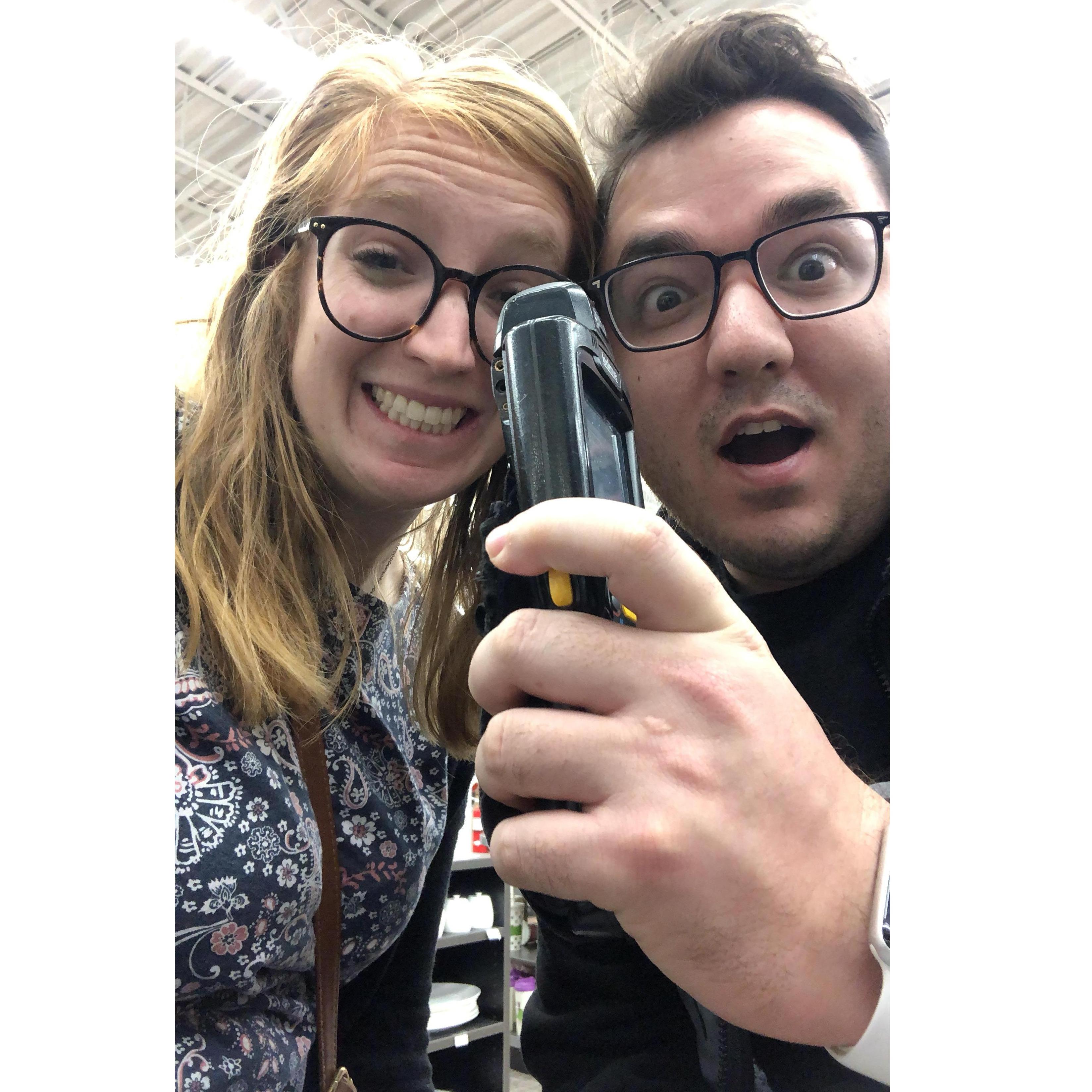 Doing our registry at Bed, Bath & Beyond. Who knew trash cans could be so $$$
