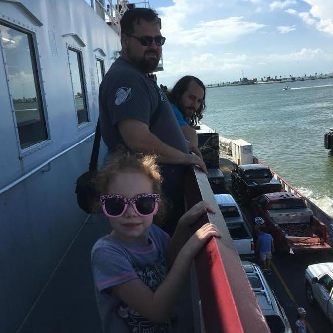 Showing Jake's niece the ferry in Galveston.