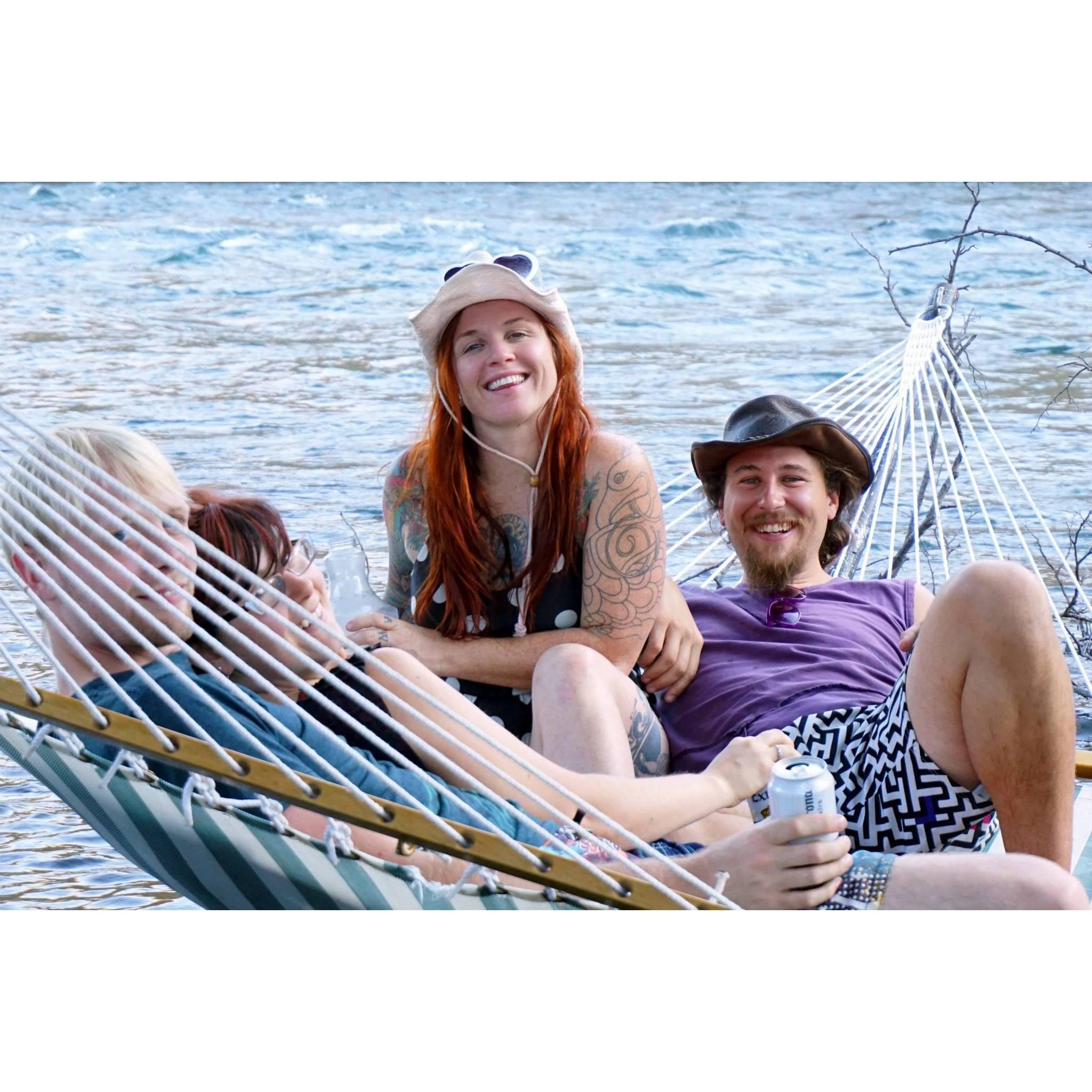 Lounging in a riverside hammock with two of their best friends Michael and Tracey