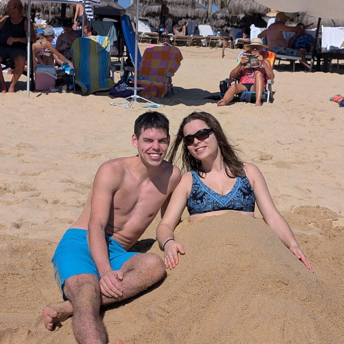 Rogan buried Kaitlyn in the sand haha
