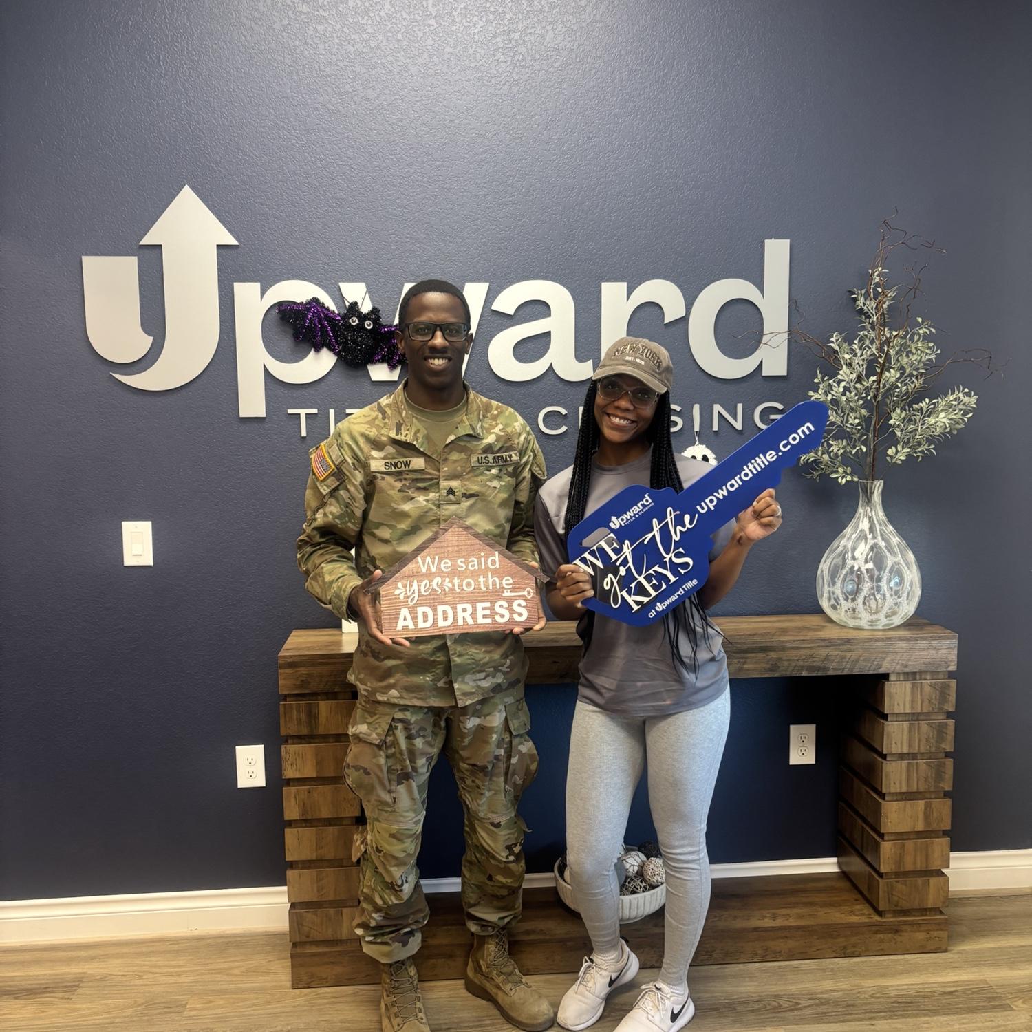 This photo captures the day when we purchased our first home in Houston, TX.