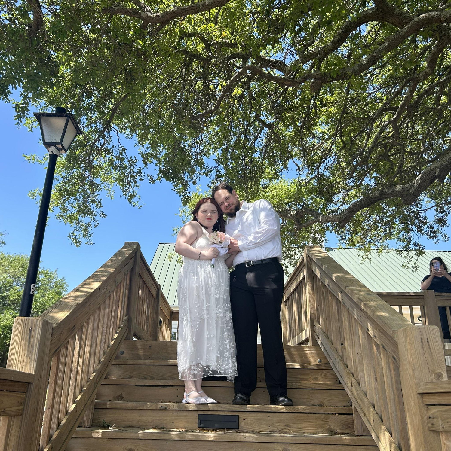 Sam's mom photobombing was too funny to crop out!