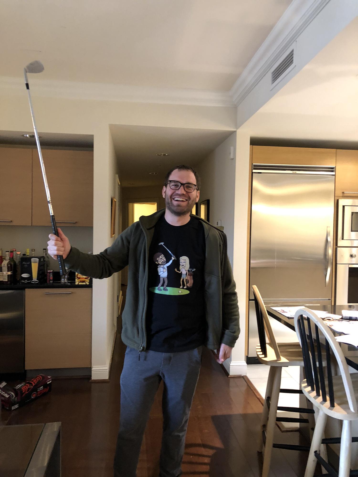 Jono wishing he was golfing, wearing a golf tee picturing me being the caddy 🙊🤣 inception