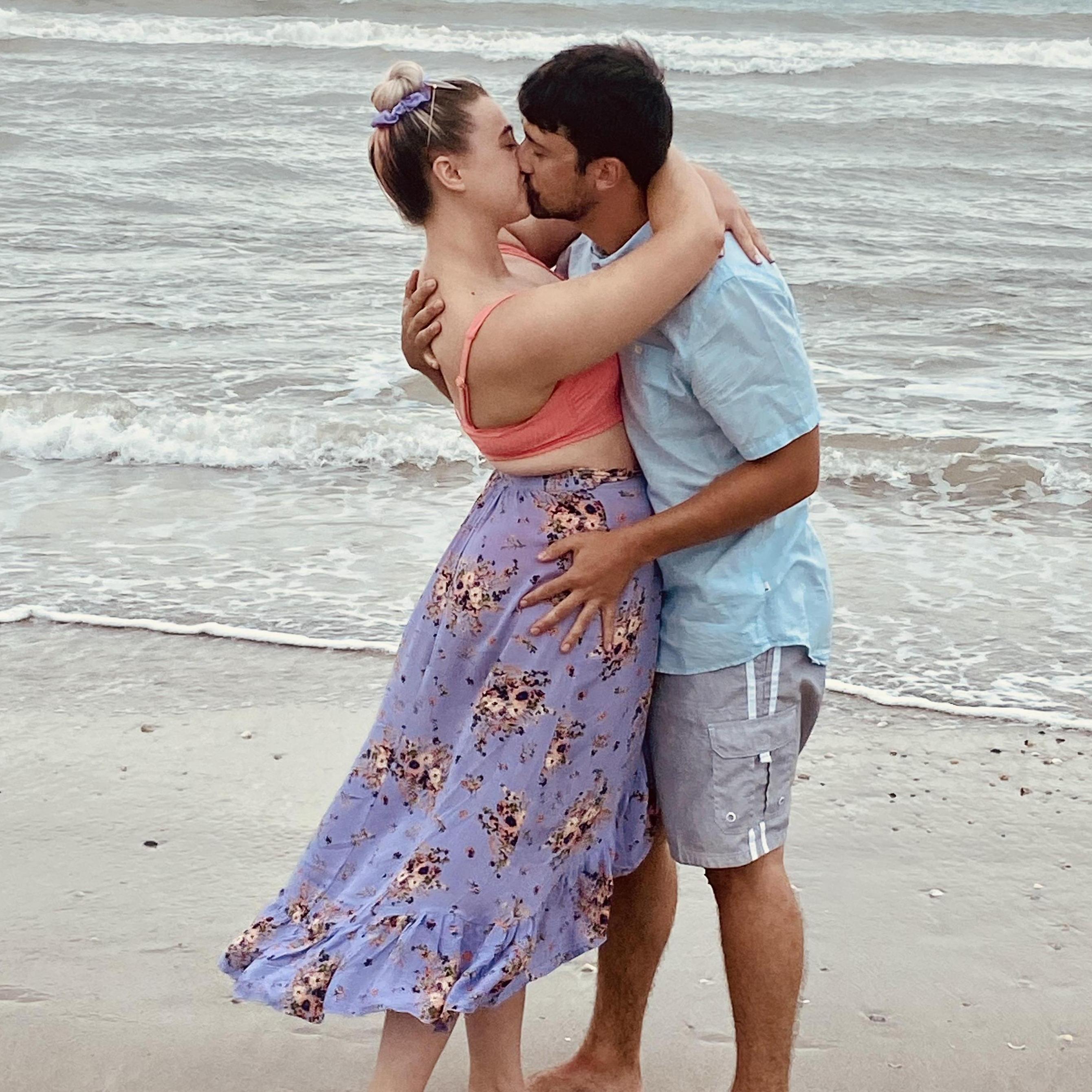 Bailey and Grant on Cocoa Beach right after he proposed.