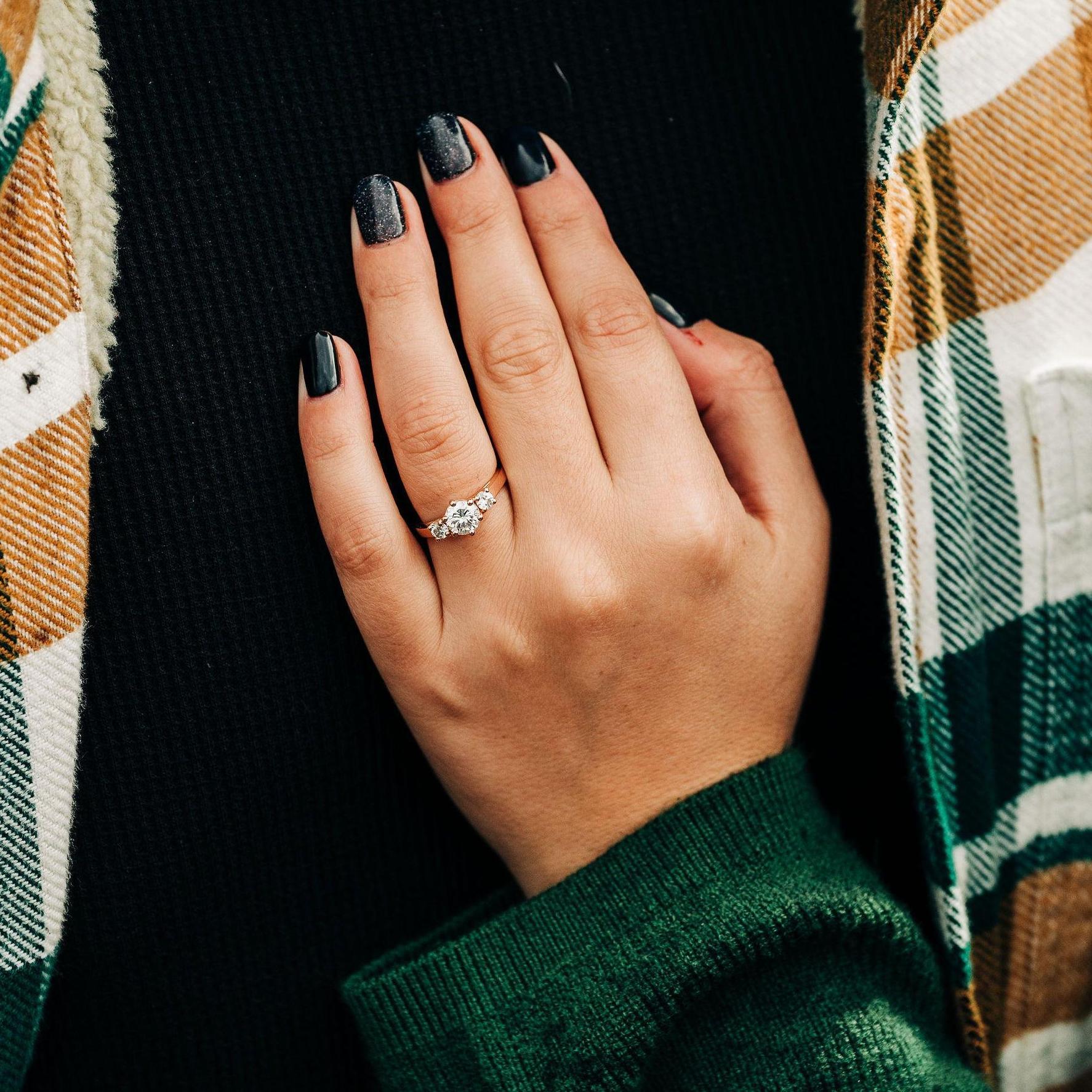 Jill's engagement ring - Bobby used his grandmother's diamond and had the ring custom-made by a jeweler in Jill's hometown.