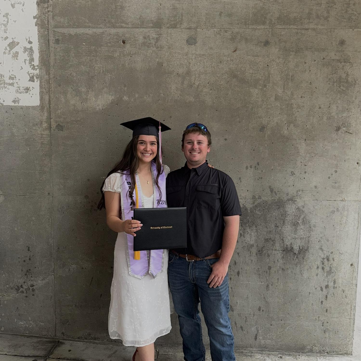 Autrey's college graduation! Ty's support is the reason she was able to be a full time college student.