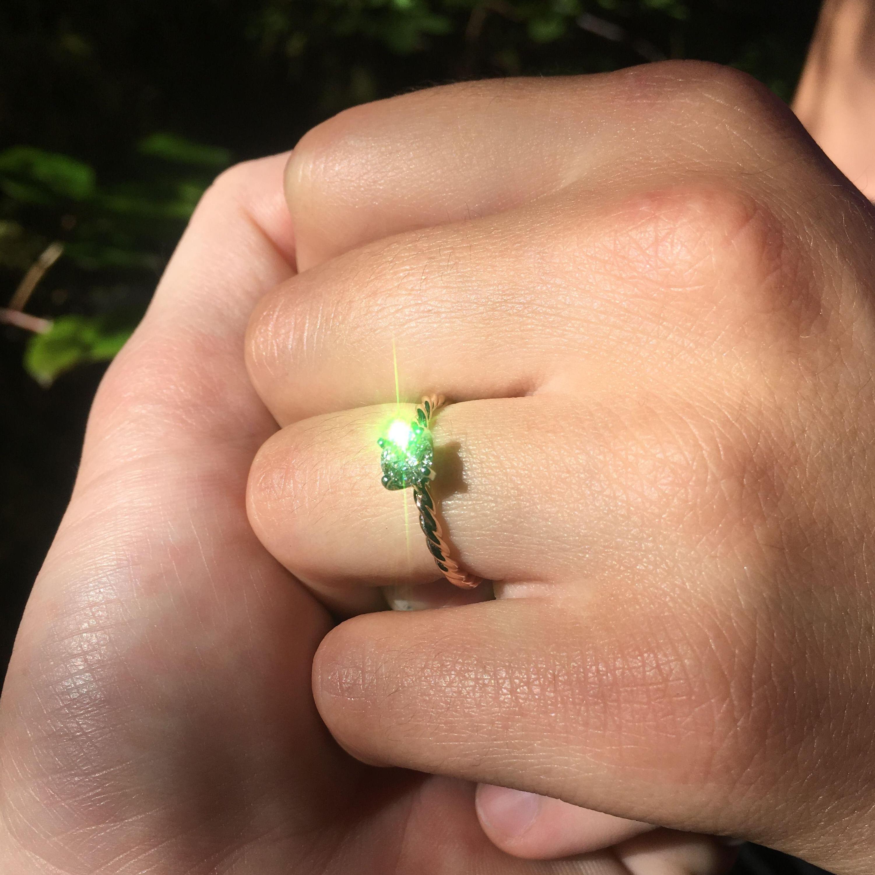 Dom's engagement ring reflecting the sunlight