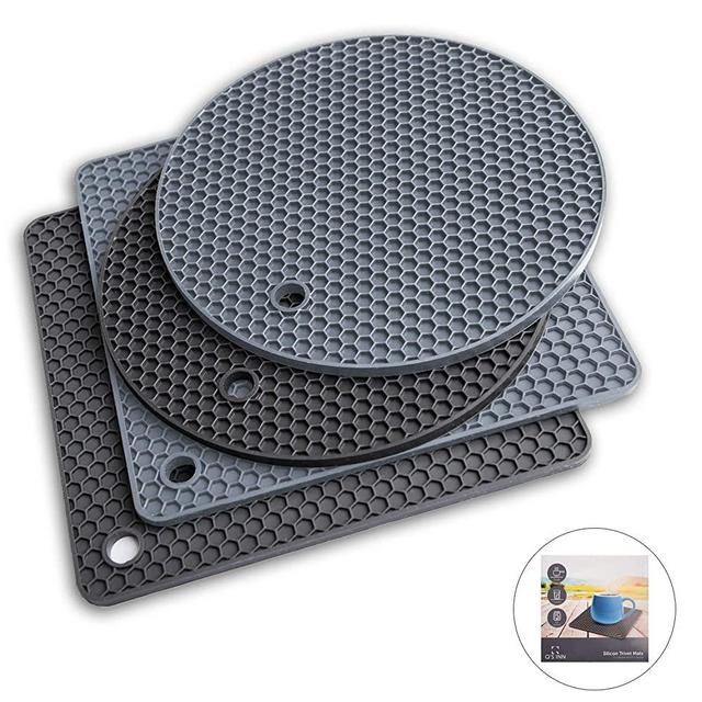 Pot holders and Silicone Trivet Mats. Our 7 in 1 Multi-Purpose Kitchen Tool is Heat Resistant to 440°F, Non-slip,durable, flexible easy to wash and dry. 4 Potholders By Q's INN.