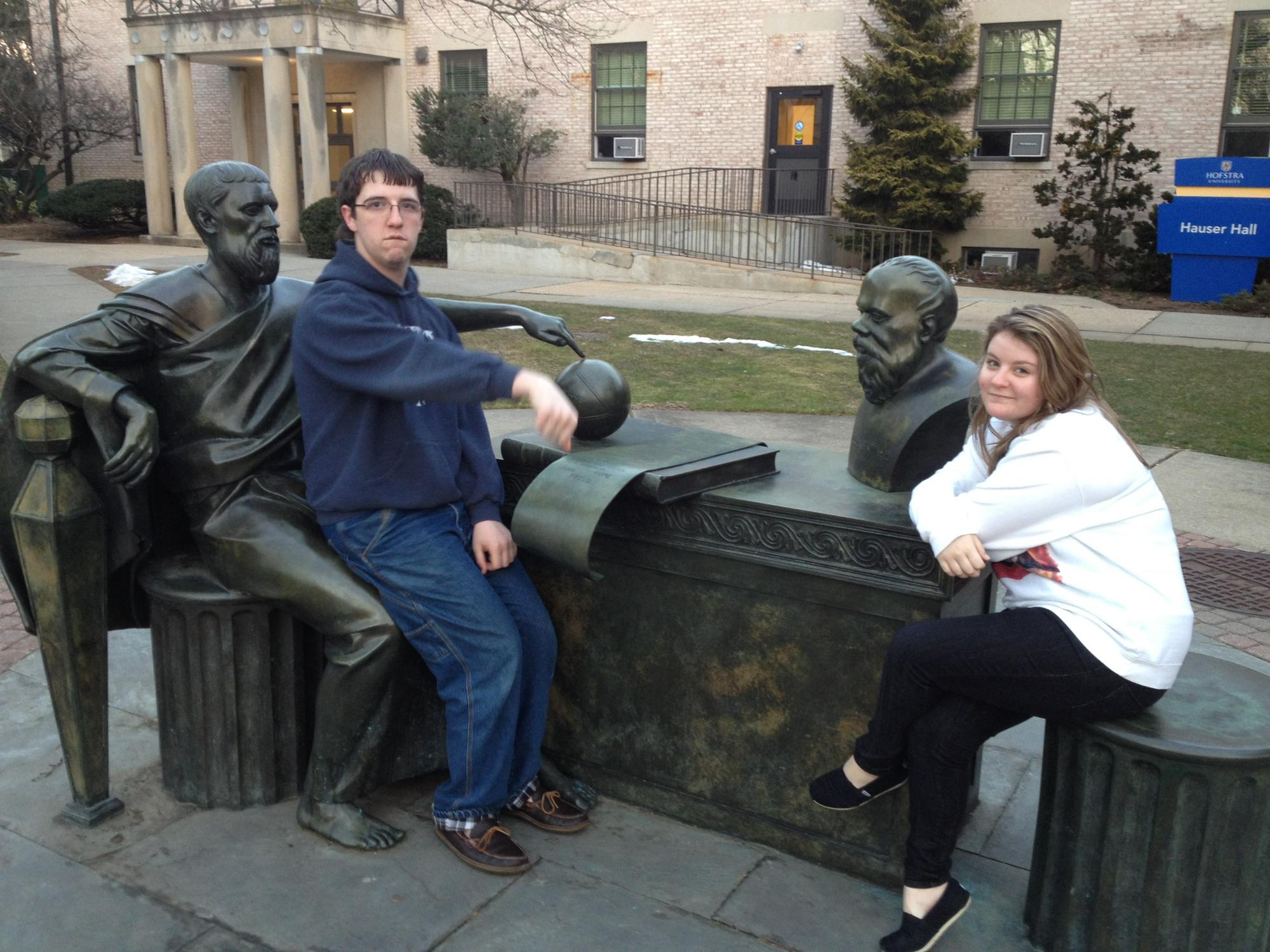 Sitting on statues at Hofstra, sophomore year.