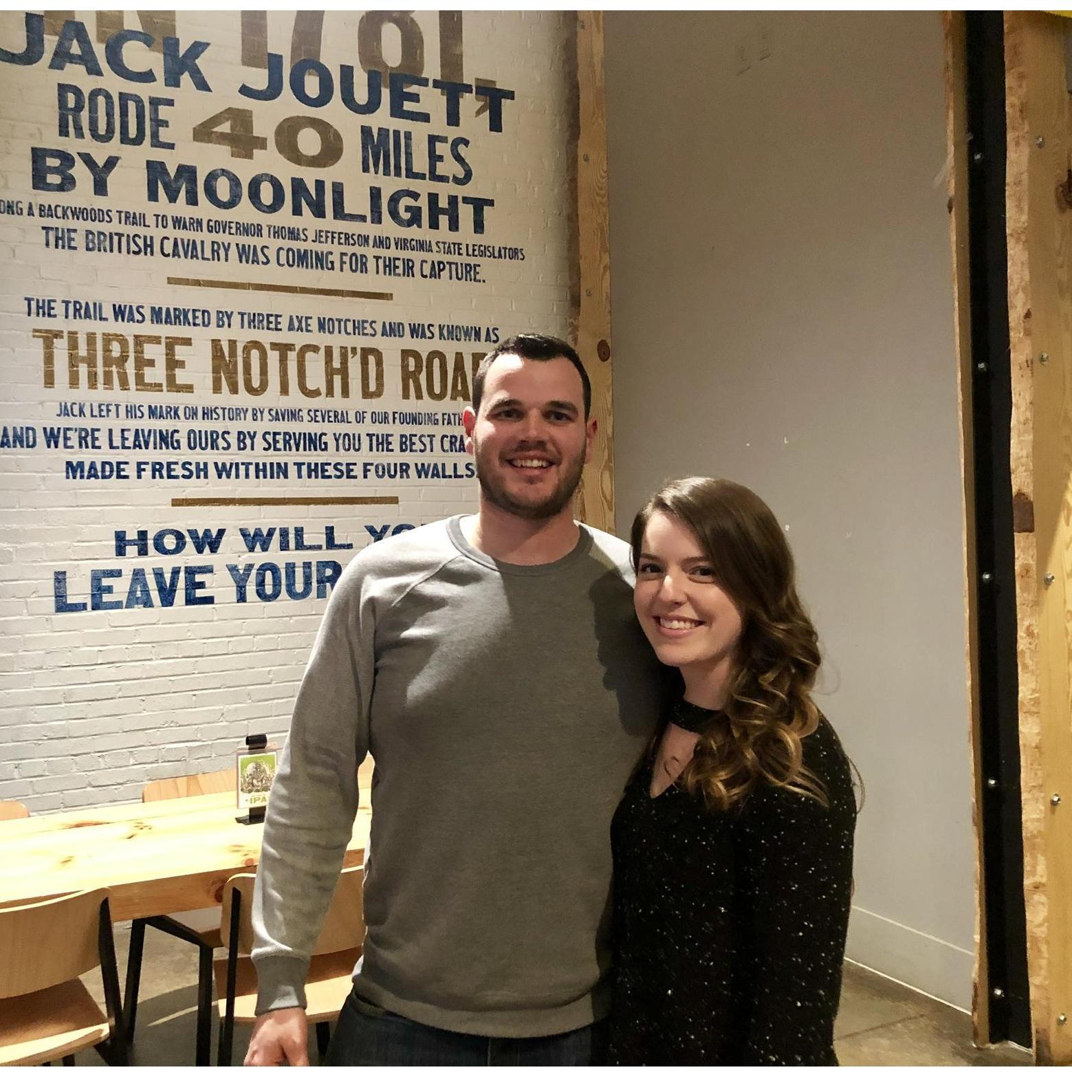 Our first picture together. It happens to be at Three Notched Brewery where we went on our first date!