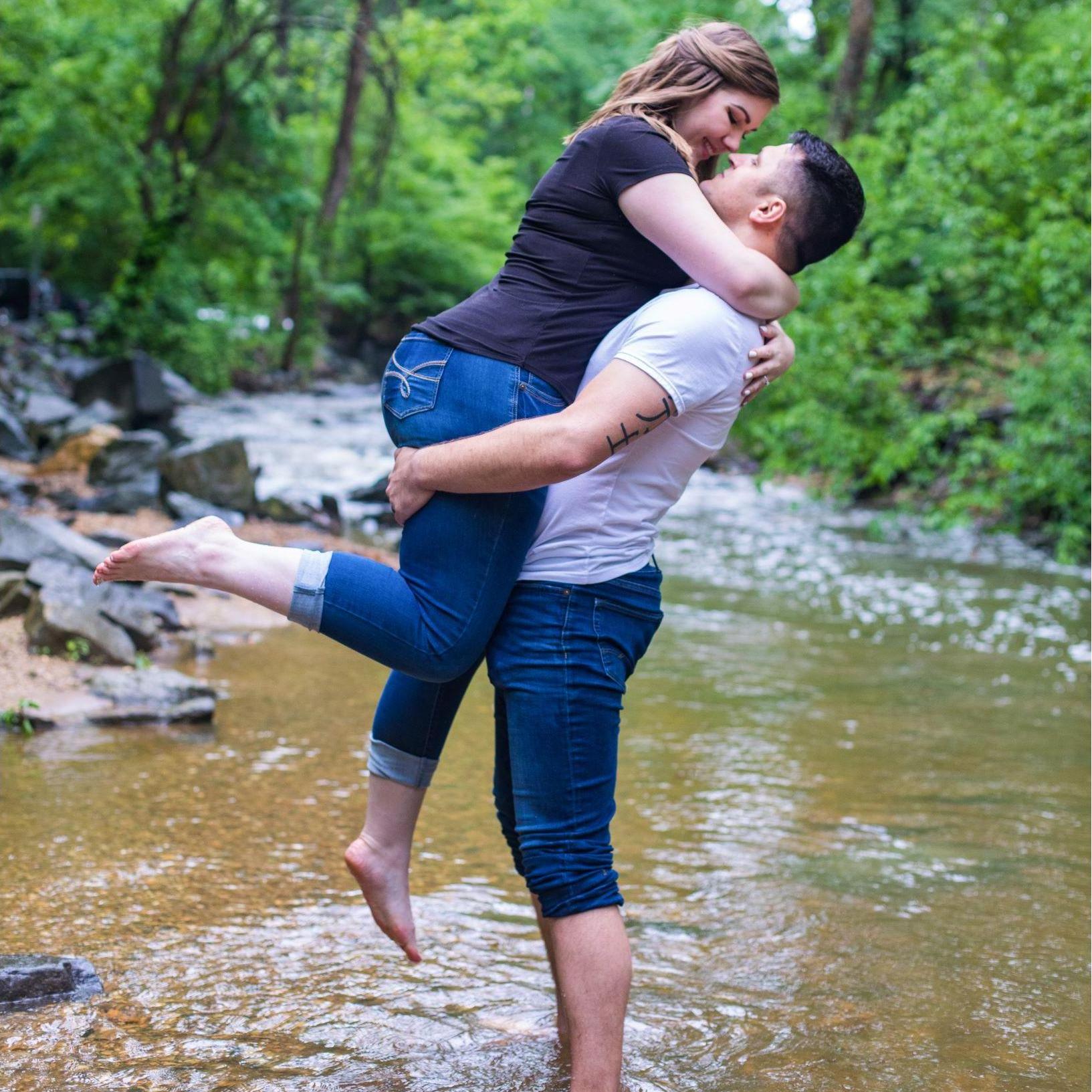 One of our engagement photos. We were lucky to find a photographer who didn't mind wading into the river with us!