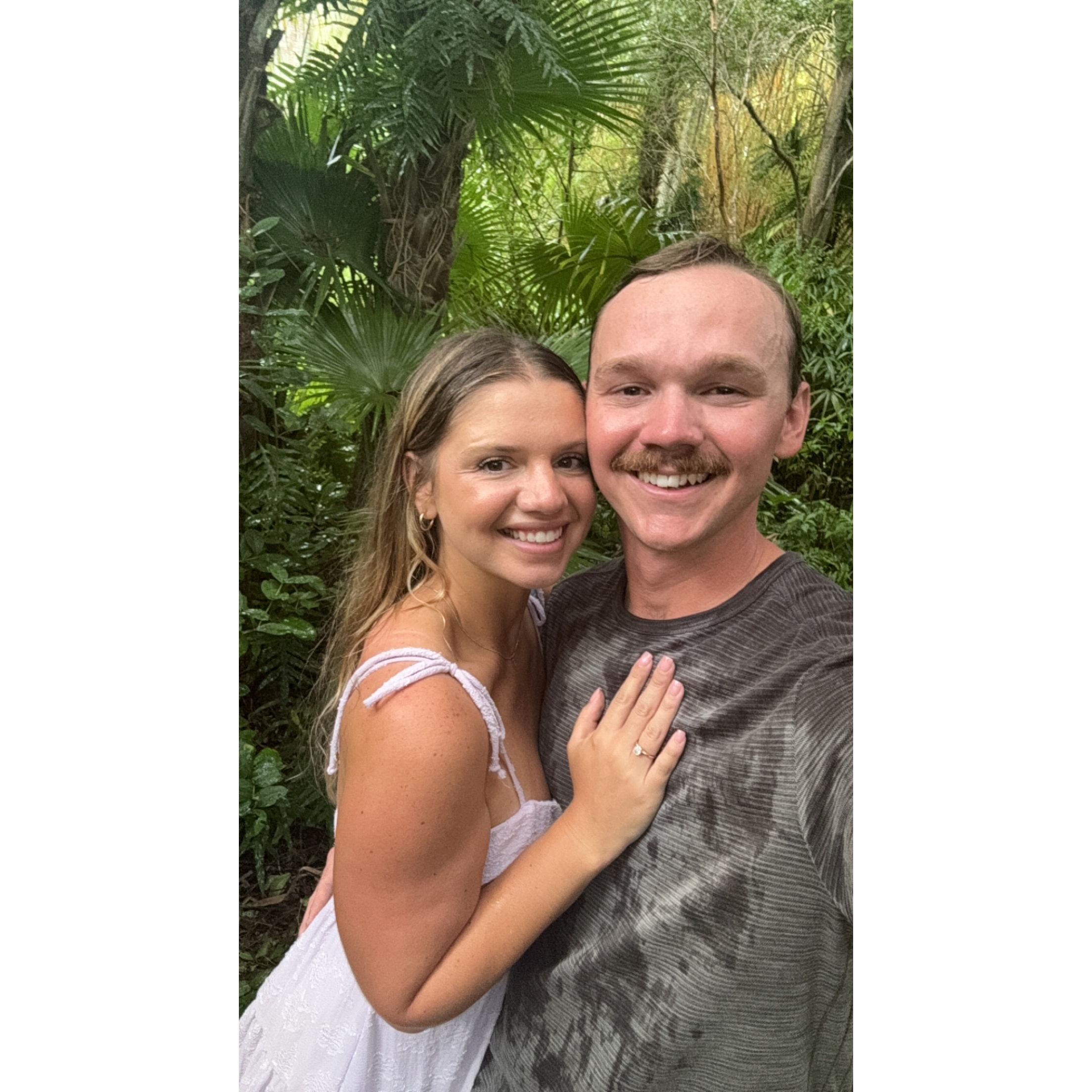 It started raining shortly after the proposal but that’s good luck right?!