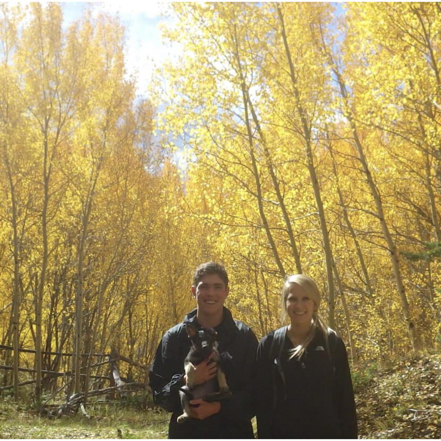 Family portrait 1 year into dating. Roxy's first fall