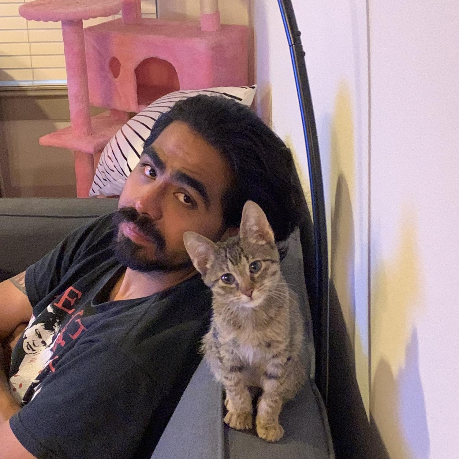 We adopted Hamburger on 5/26/24 - He and Jon are the best of buddies!