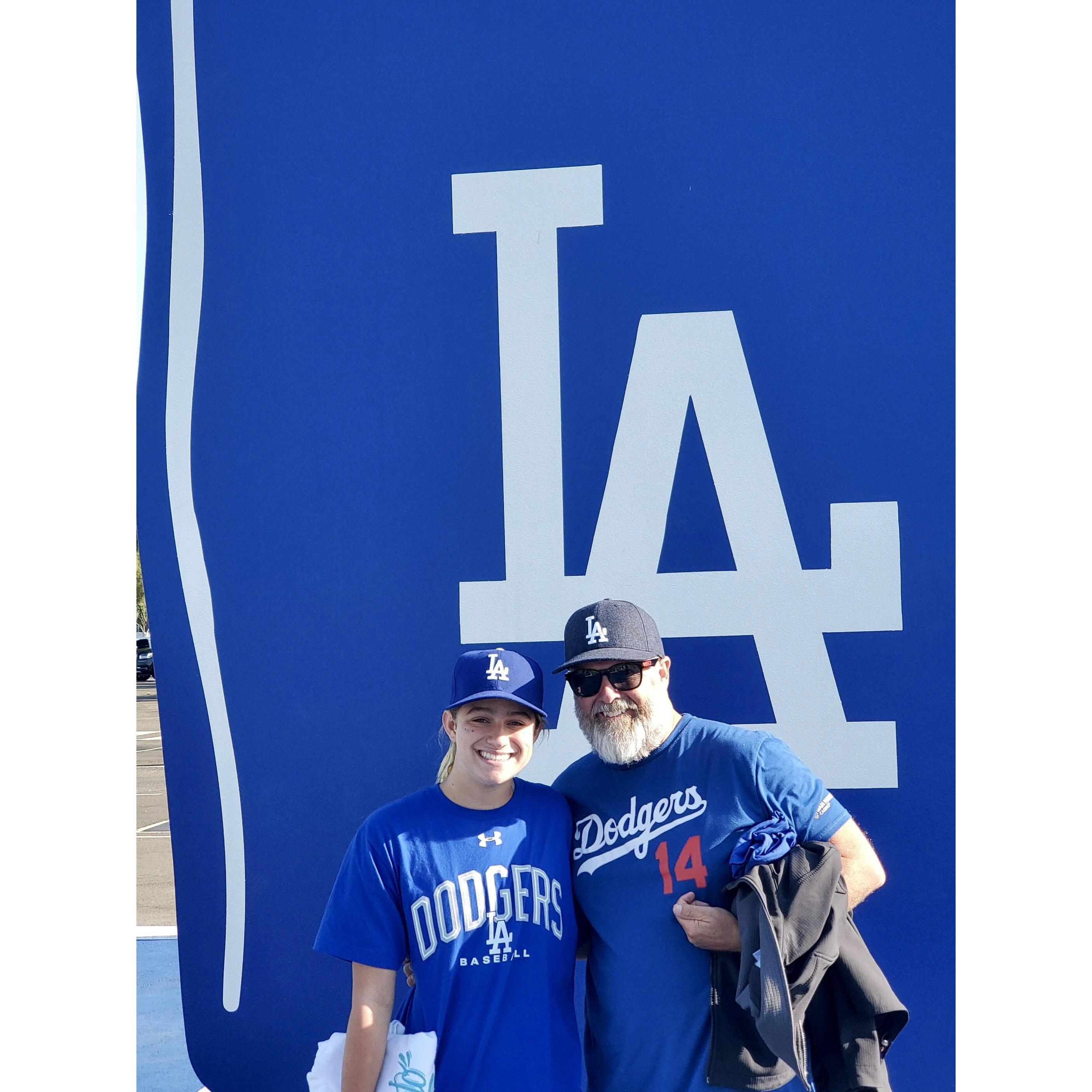 "Father/Daughter" Day at the baseball game. ***Proof she loves him - she's wearing a dodgers shirt!***