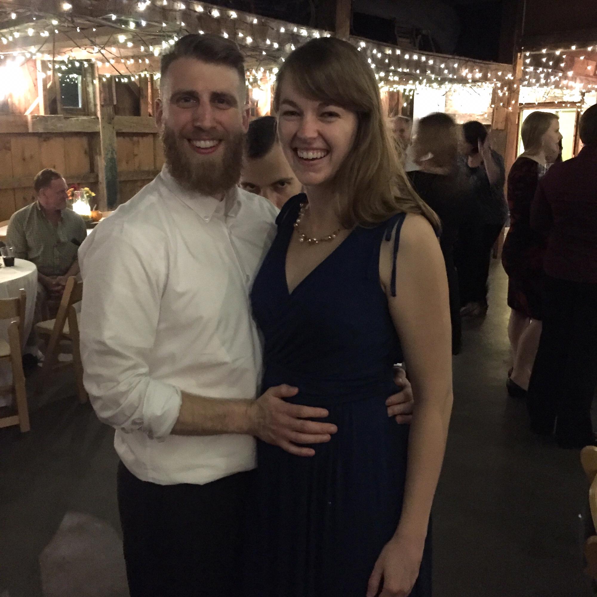 Looking classy at yet another friend's wedding, this time with a creepy visitor in our background.