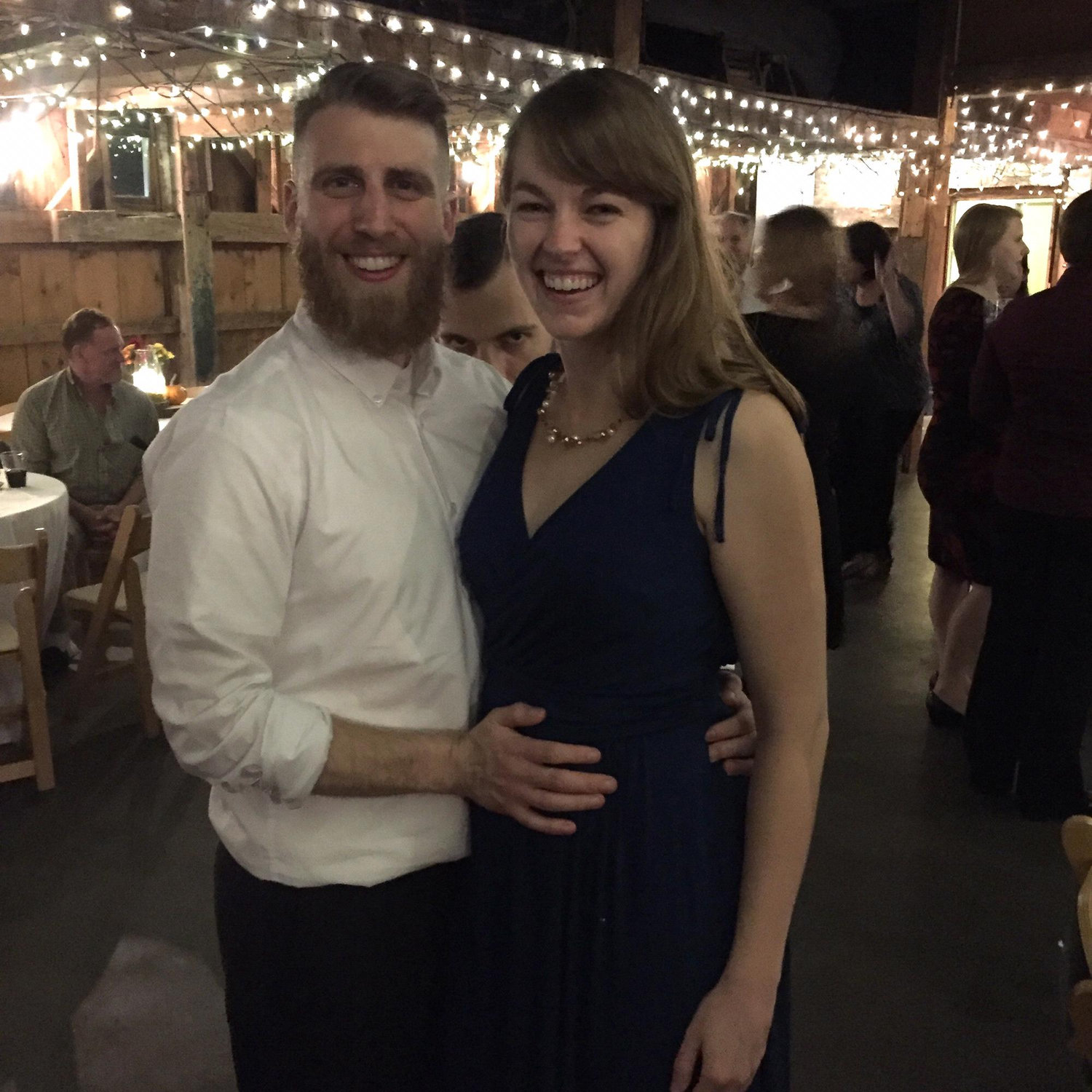 Looking classy at yet another friend's wedding, this time with a creepy visitor in our background.
