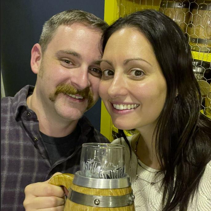 A selfie with a borrowed mug from Sinistral Brewing Company the night Joe met Katie's parents