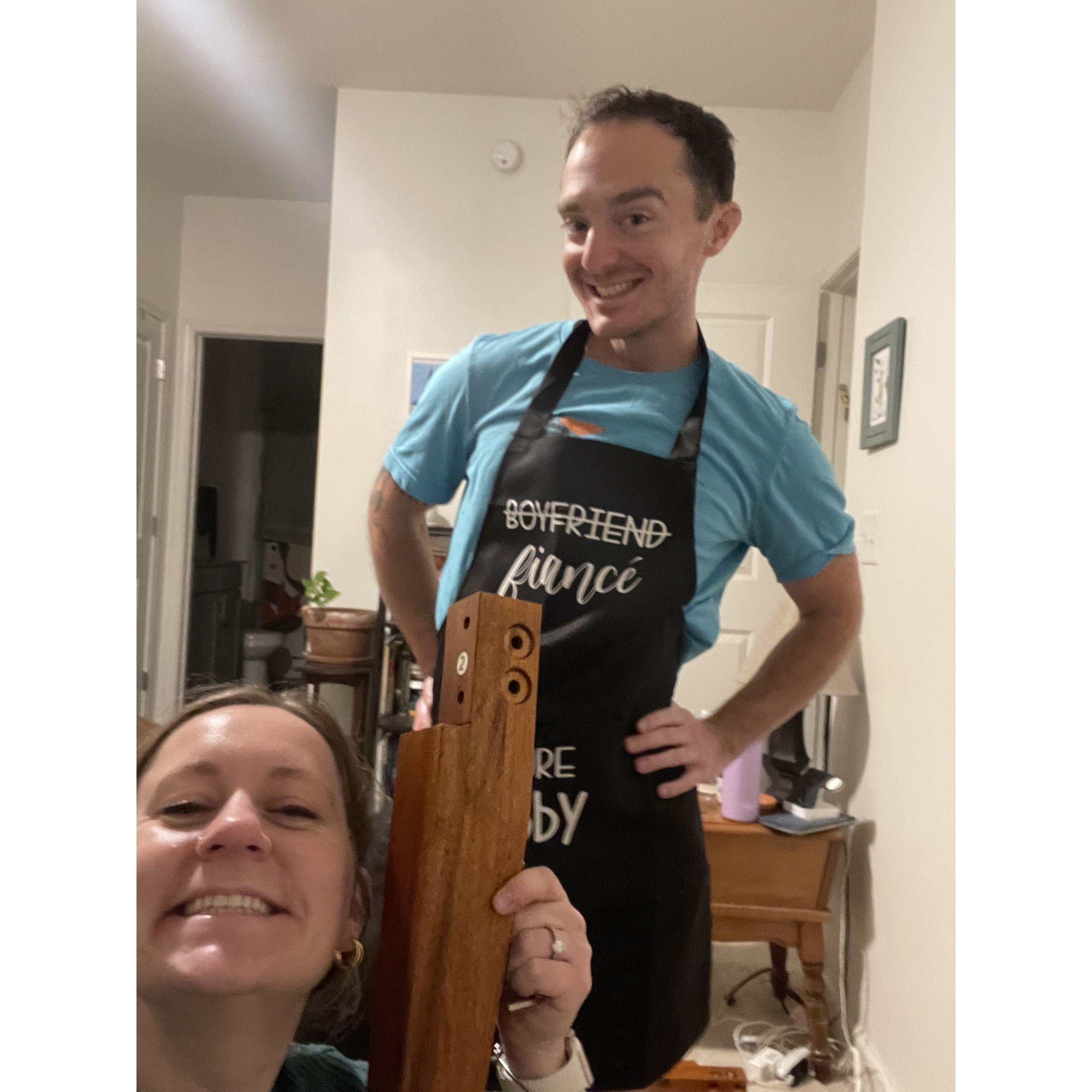 Classic couples pic! Allie builds while Jake makes dinner
