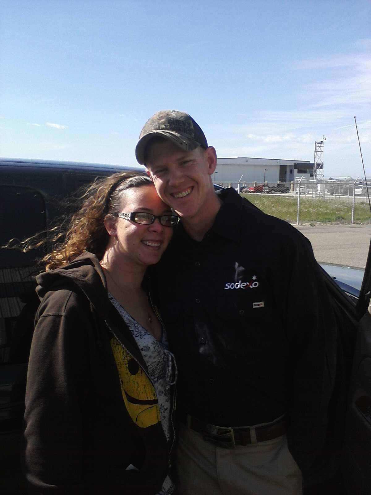 The day after our wedding. Jeramy was getting ready to get on a helicopter to fly to work offshore.