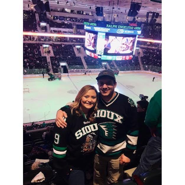 Annie surprised Dusty with Sioux hockey tickets for his birthday one year!