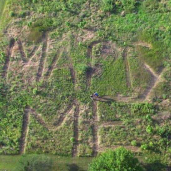 He mowed "Marry Me" in the long grass of the new lot we had just closed on in June 2024. Kristi was caught completely off guard!