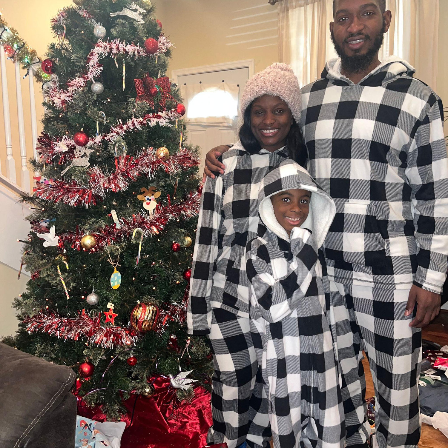 Our little holiday crew, wrapped in love and flannel