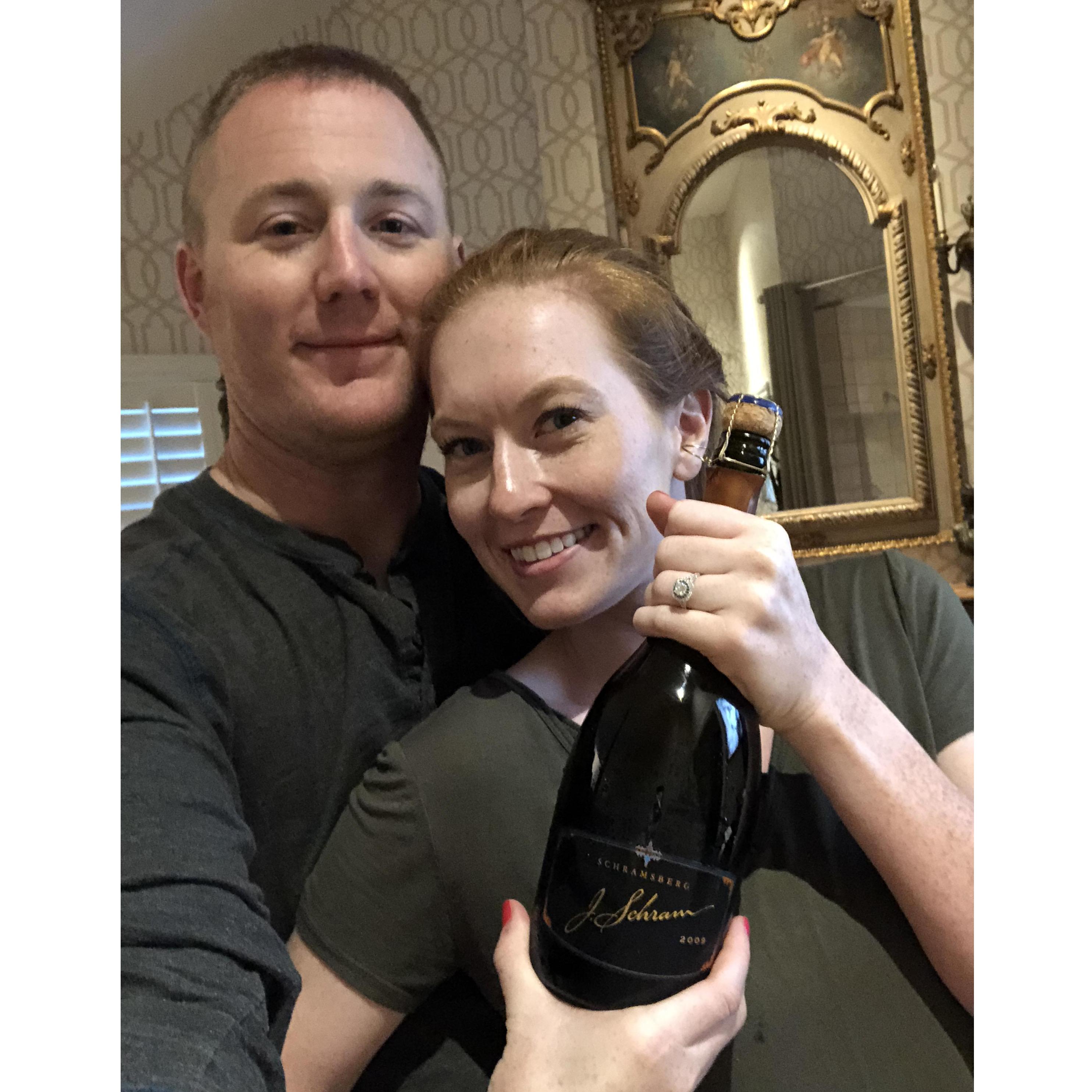 After the proposal, celebrating with our favorite wine.