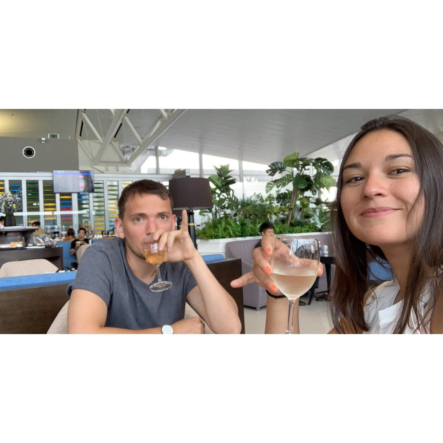 Megan and Mike in an Airport Lounge in Hanoi, Vietnam.