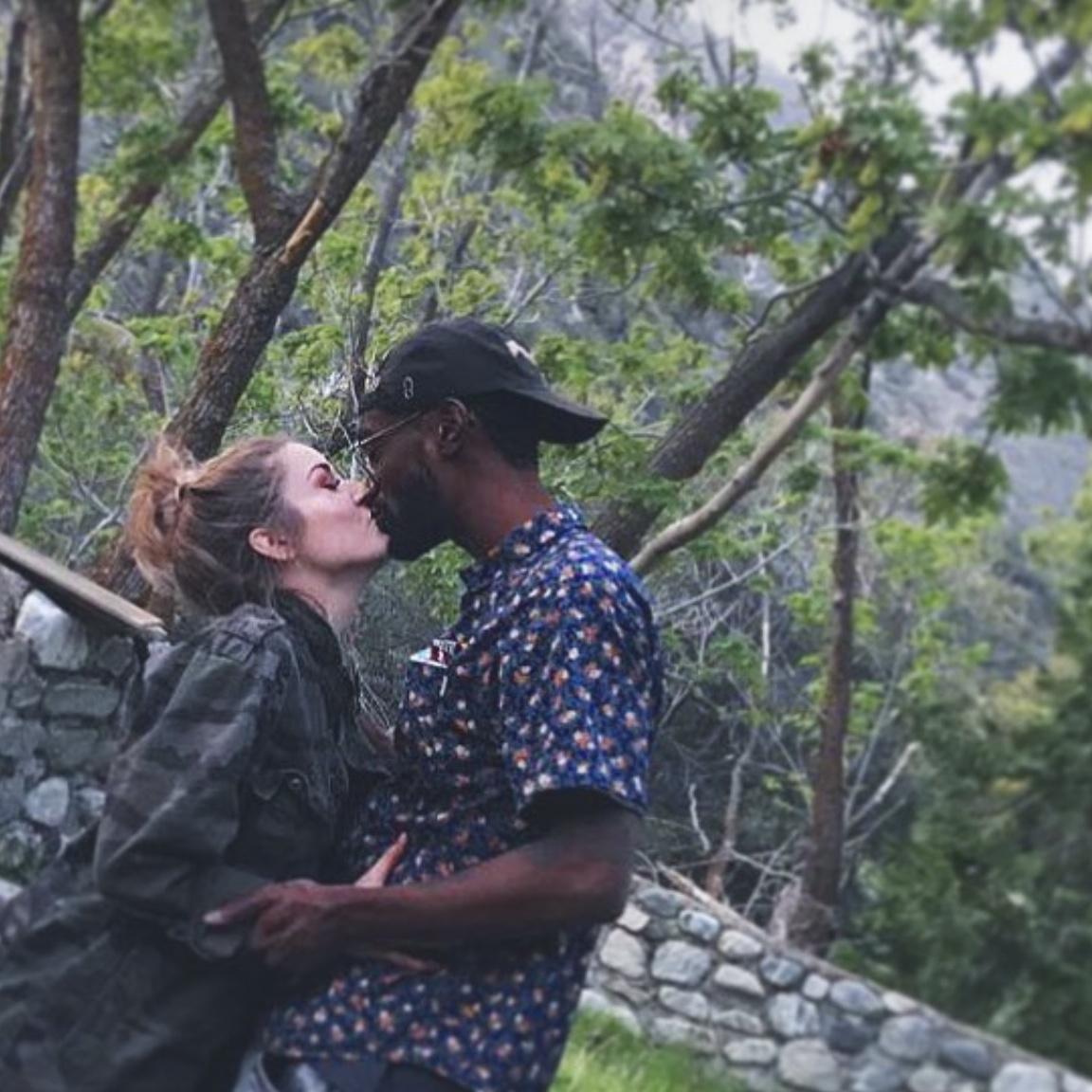 Johnny supporting me during a catered outdoor dinner party