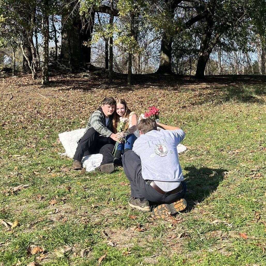 Raw engagement shoot (This photographer was not hired he just so happened to be finishing a photoshoot, and he saw our proposal and took some pictures for us for free!)