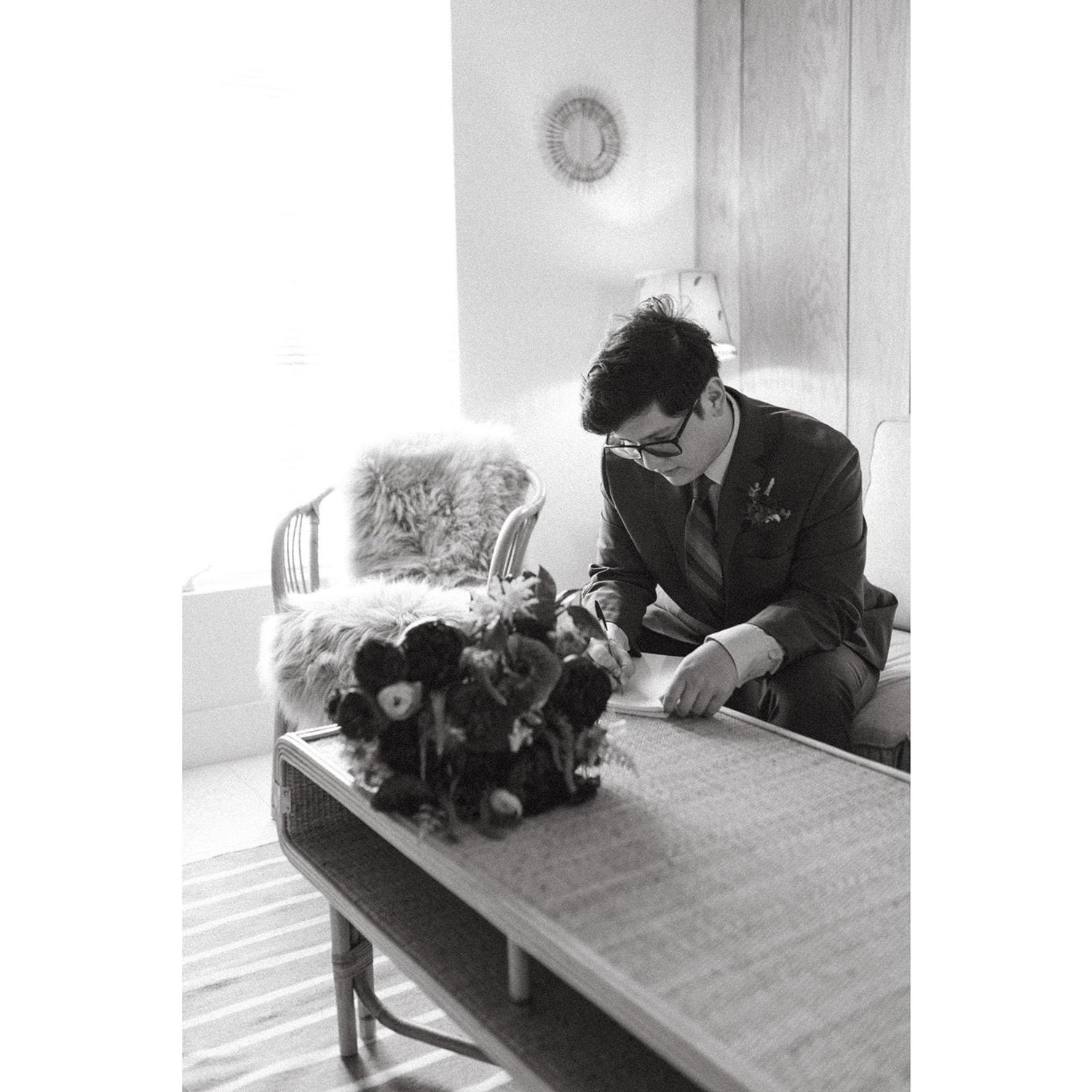 Anthony writing his vows.