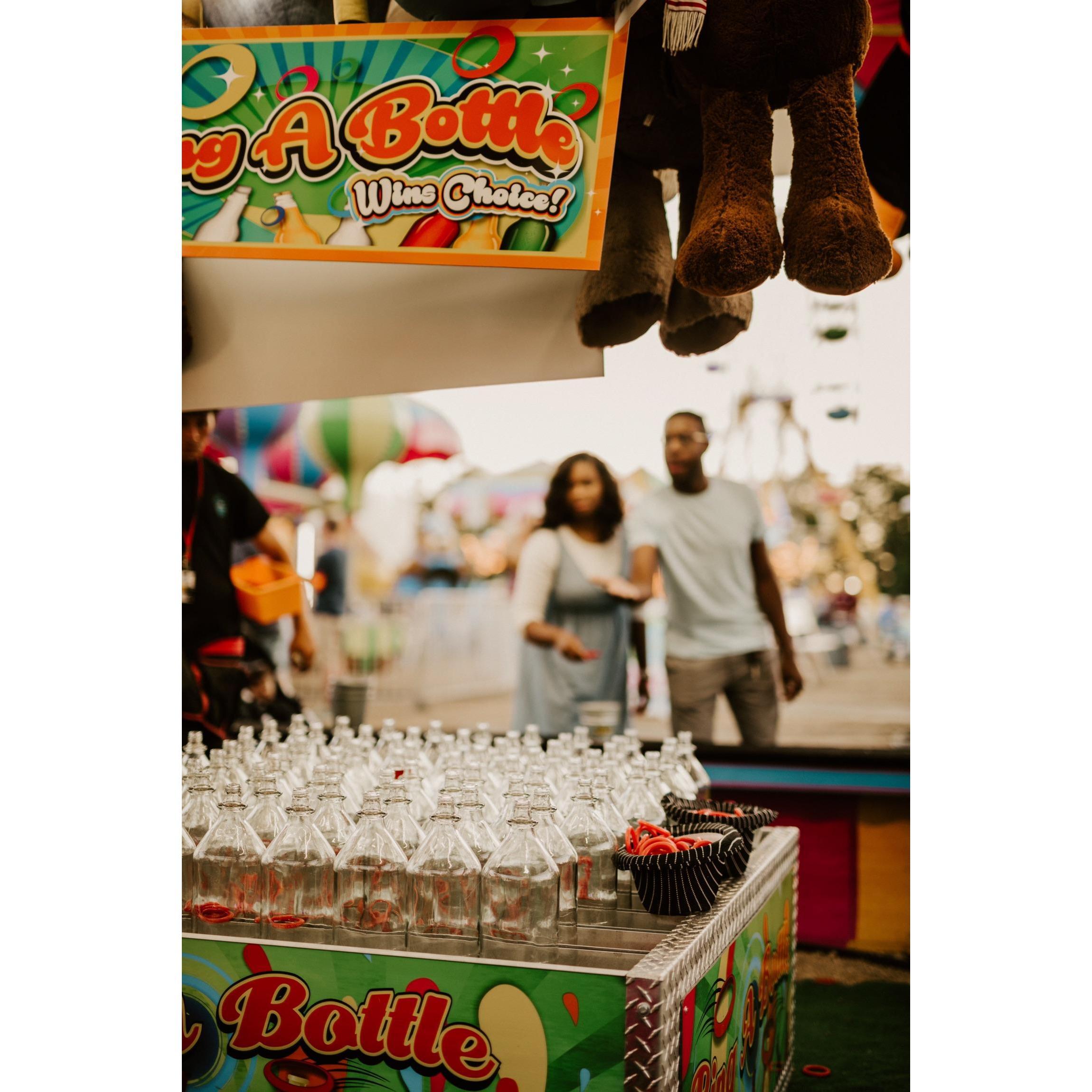 We didn't win at "Ring A Bottle", but we won when you placed that ring on my finger! Ha! Get it?