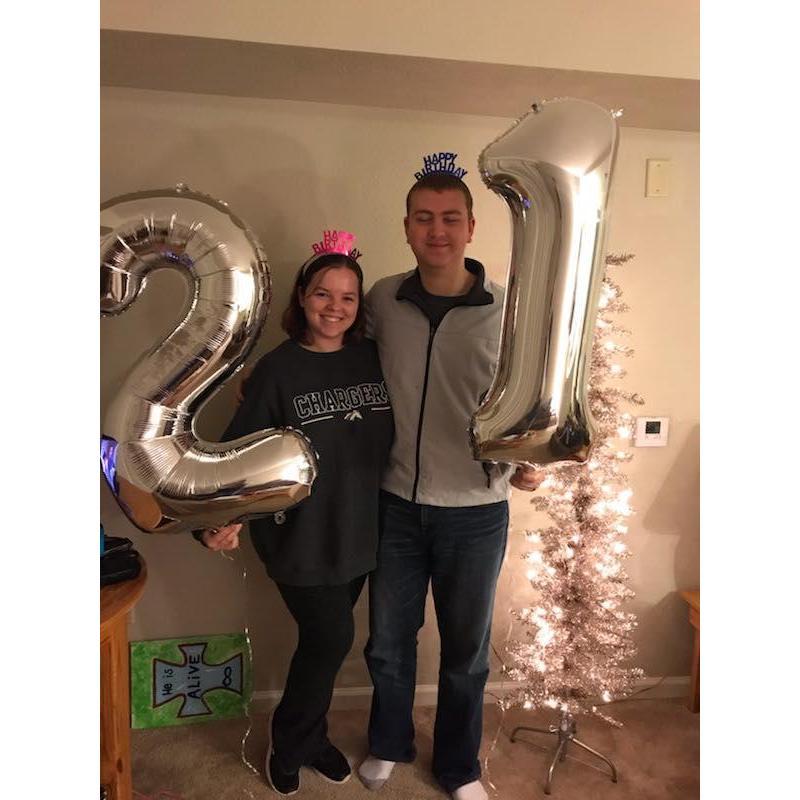 He might have his eyes closed, but this was a super fun night! Celebrating 21 with my love, my family, and a Christmas tree was perfect!