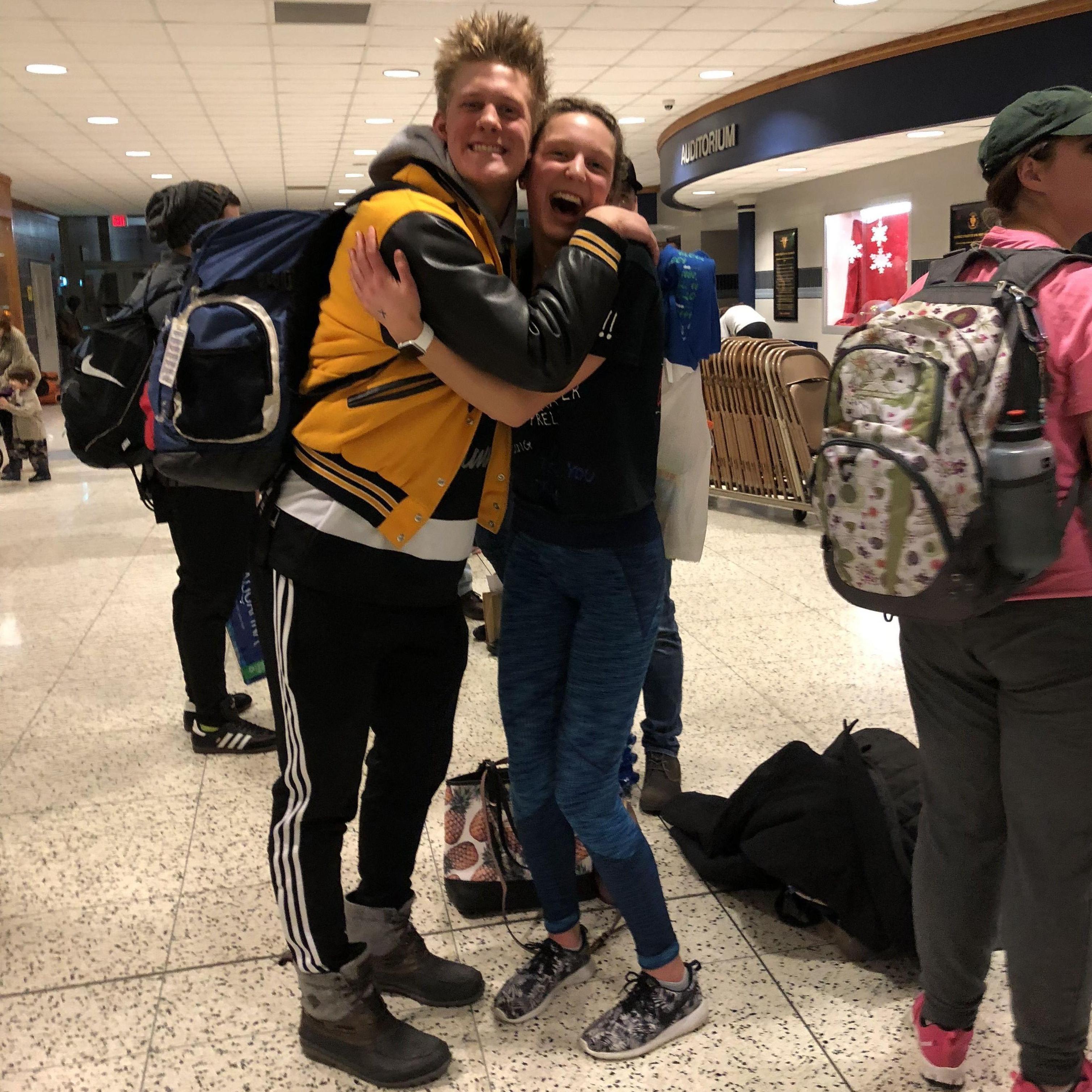 This is the photo at that swim meet! Our teams were very excited that we finally met in person. This was about a 5 minute interaction total haha