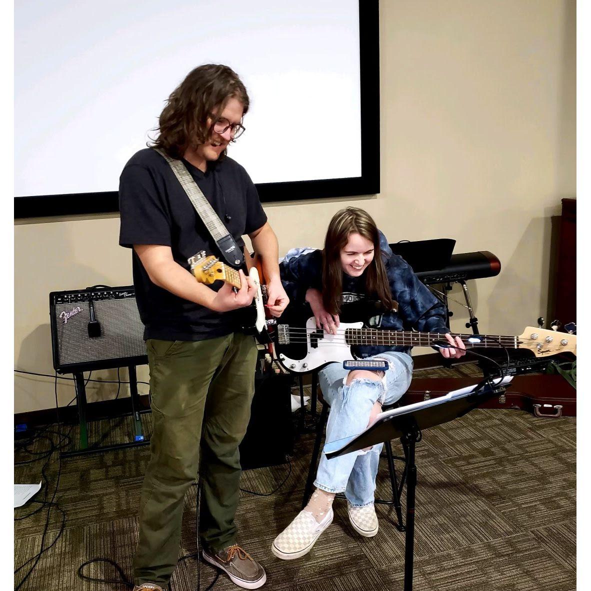 Nolan teaching Rachel the Bass