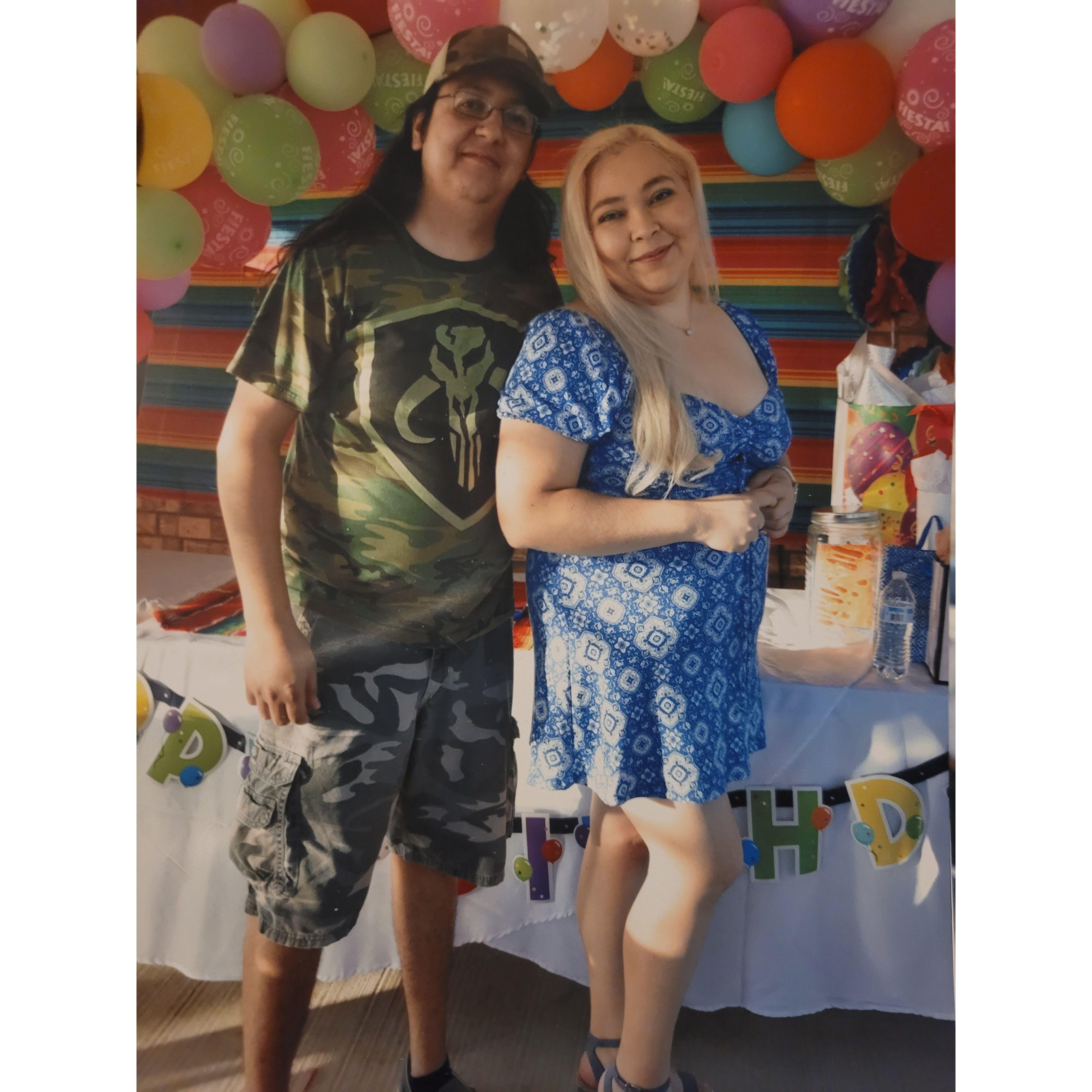 This photo was taken at my 30th surprise birthday party where we announced to our family and friends that we would be getting married in 2 years.