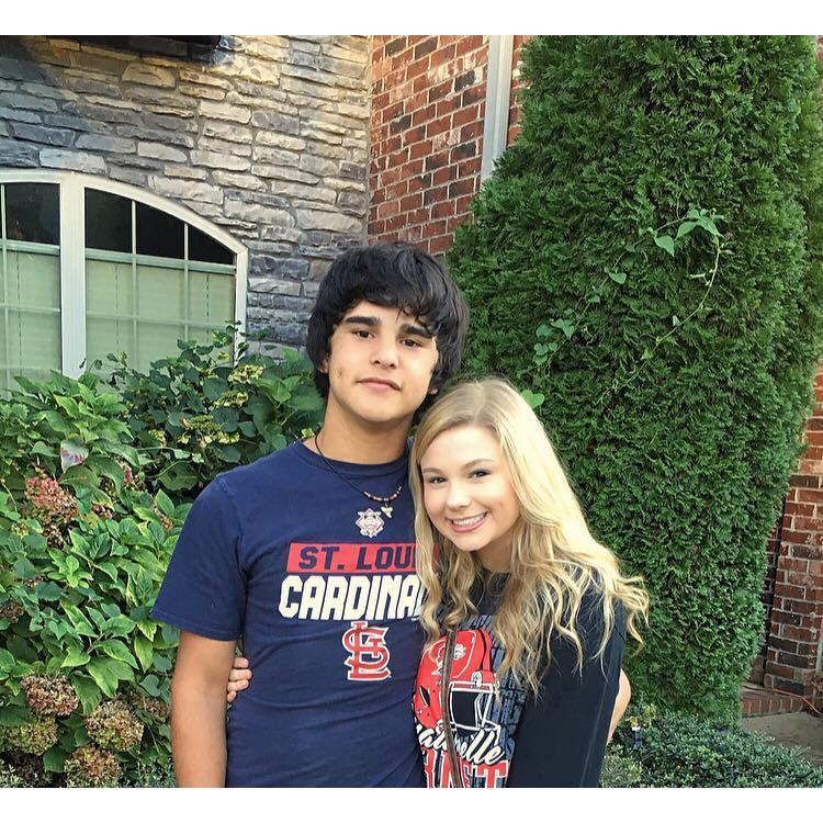 Before a high school football game as sophomores