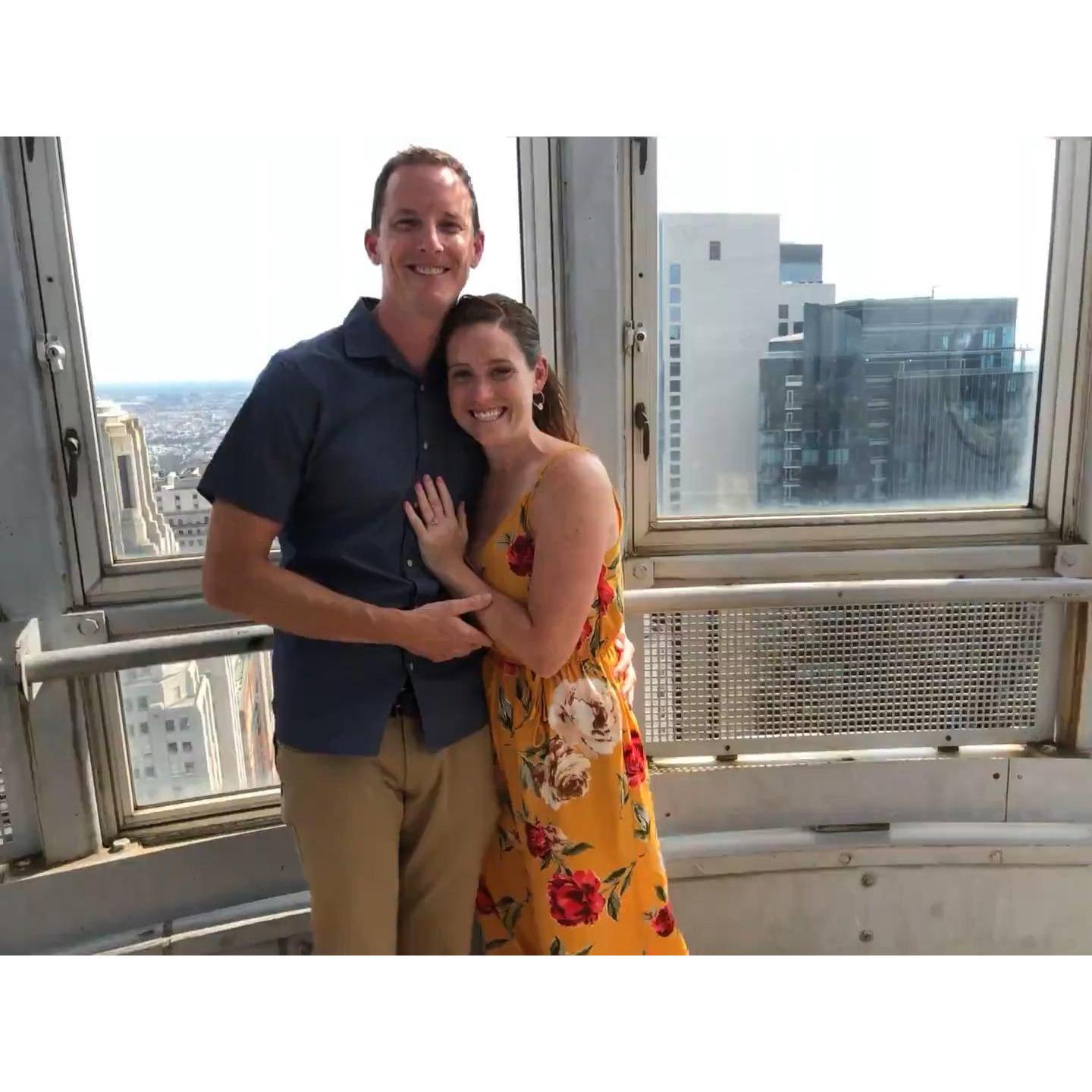 Our first pic after the proposal, top of City Hall!