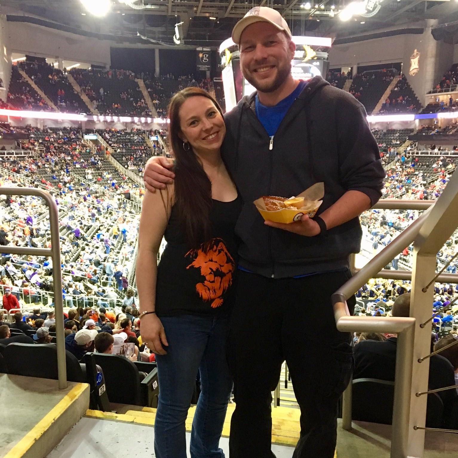 Amy surprised Patrick with tickets to the NCAA Big 12 basketball tournament in Kansas City when they were first dating and this is one of the couple's favorite photos together.