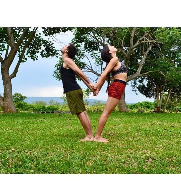 Leading a partner yoga class in Chiang Rai, Thailand, during Rae’s residency as a Yoga teacher there in 2018.