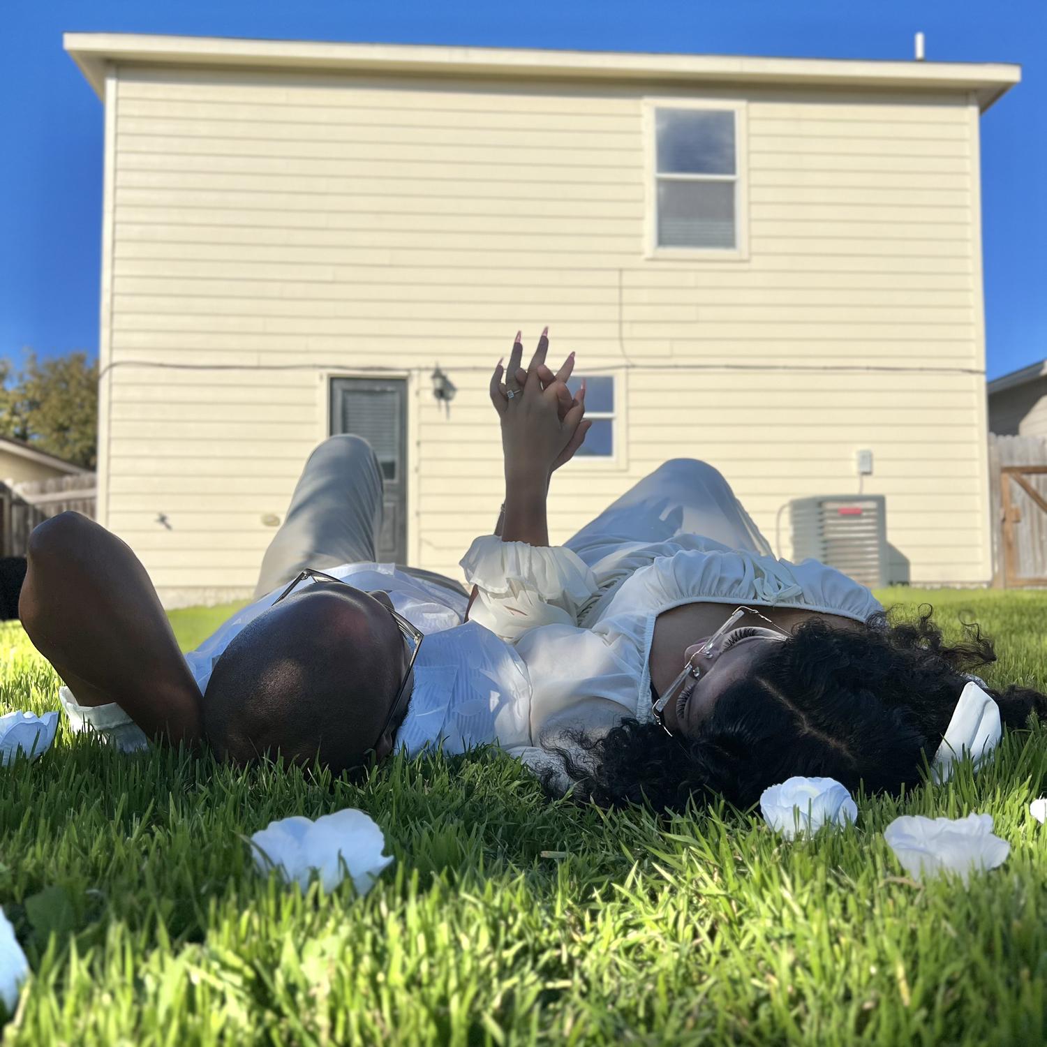 laying in the backyard at house in san antonio