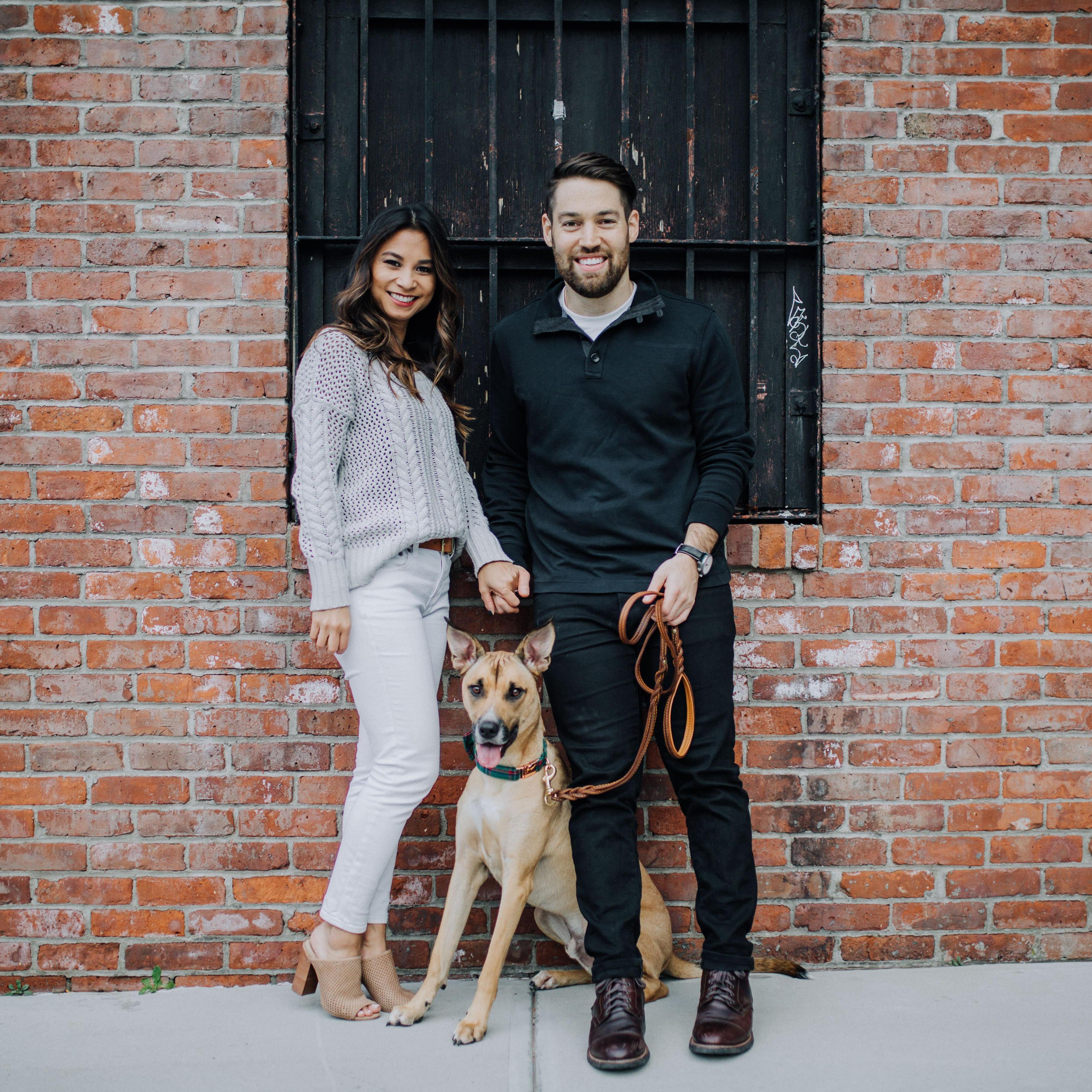 Our favorite family photo. Max looks well behaved, but there are actually treats and squeaky toys hiding behind us!