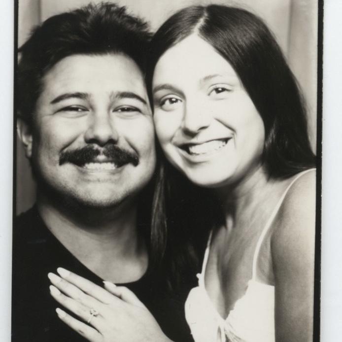 We have lost count of how many times we have taken pictures in a photo booth — stay tuned because we just had to have wedding pictures in a real photo booth… hmmmm